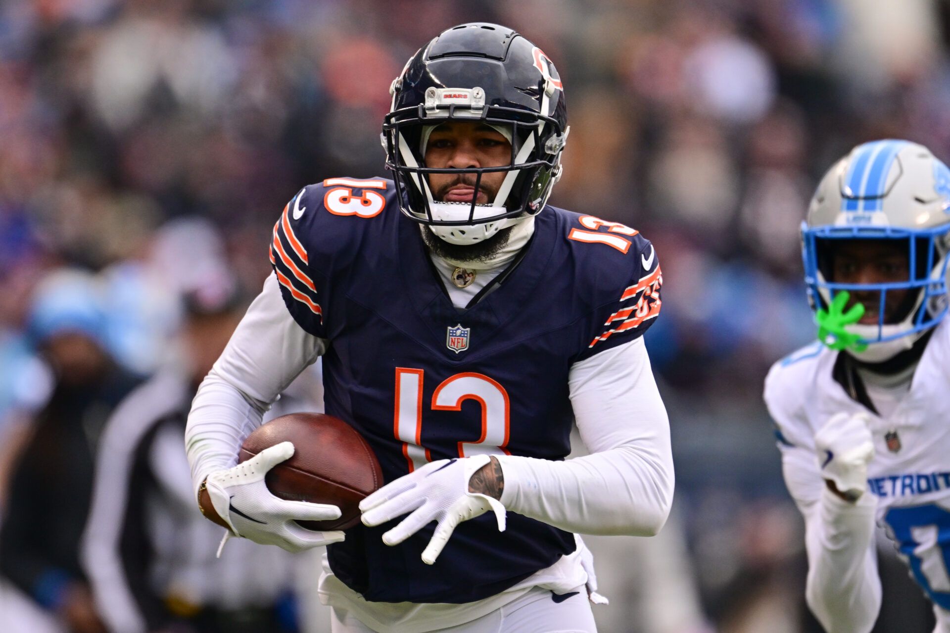 Dec 22, 2024; Chicago, Illinois, USA; Chicago Bears wide receiver Keenan Allen (13) runs after a catch against the Detroit Lions during the second quarter at Soldier Field. Mandatory Credit: Daniel Bartel-Imagn Images