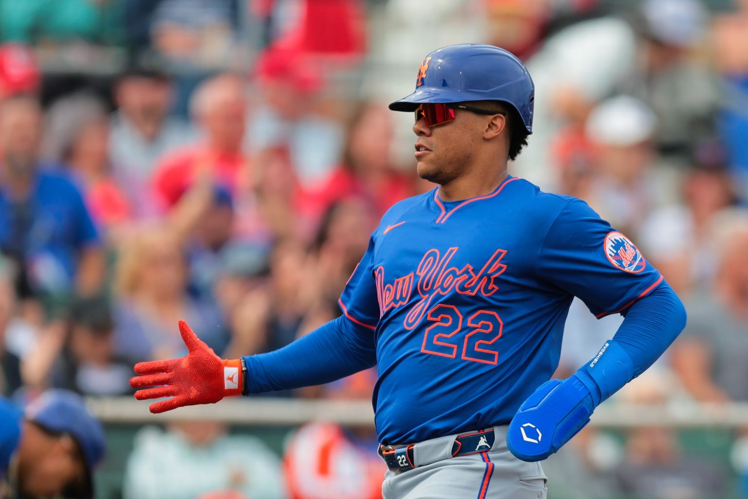 New York Mets right fielder Juan Soto (22) celebrates after scoring against the St. Louis Cardinals during the third inning at Roger Dean Chevrolet Stadium.