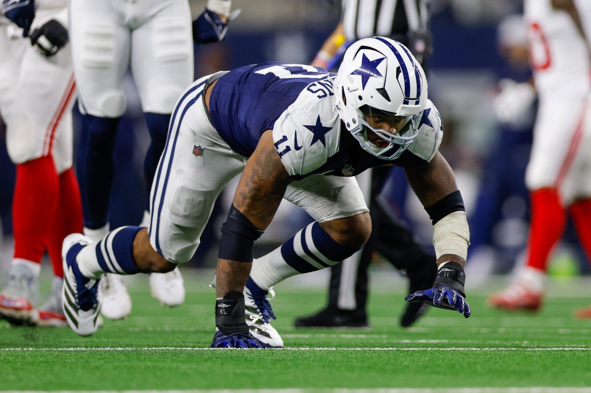 Dallas Cowboys linebacker Micah Parsons (11) celebrates after a sack during the third quarter against the New York Giants at AT&T Stadium.