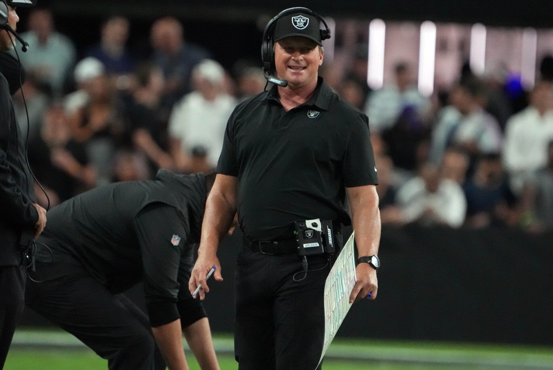 Las Vegas Raiders head coach Jon Gruden watches game action against the Baltimore Ravens during the second half at Allegiant Stadium.