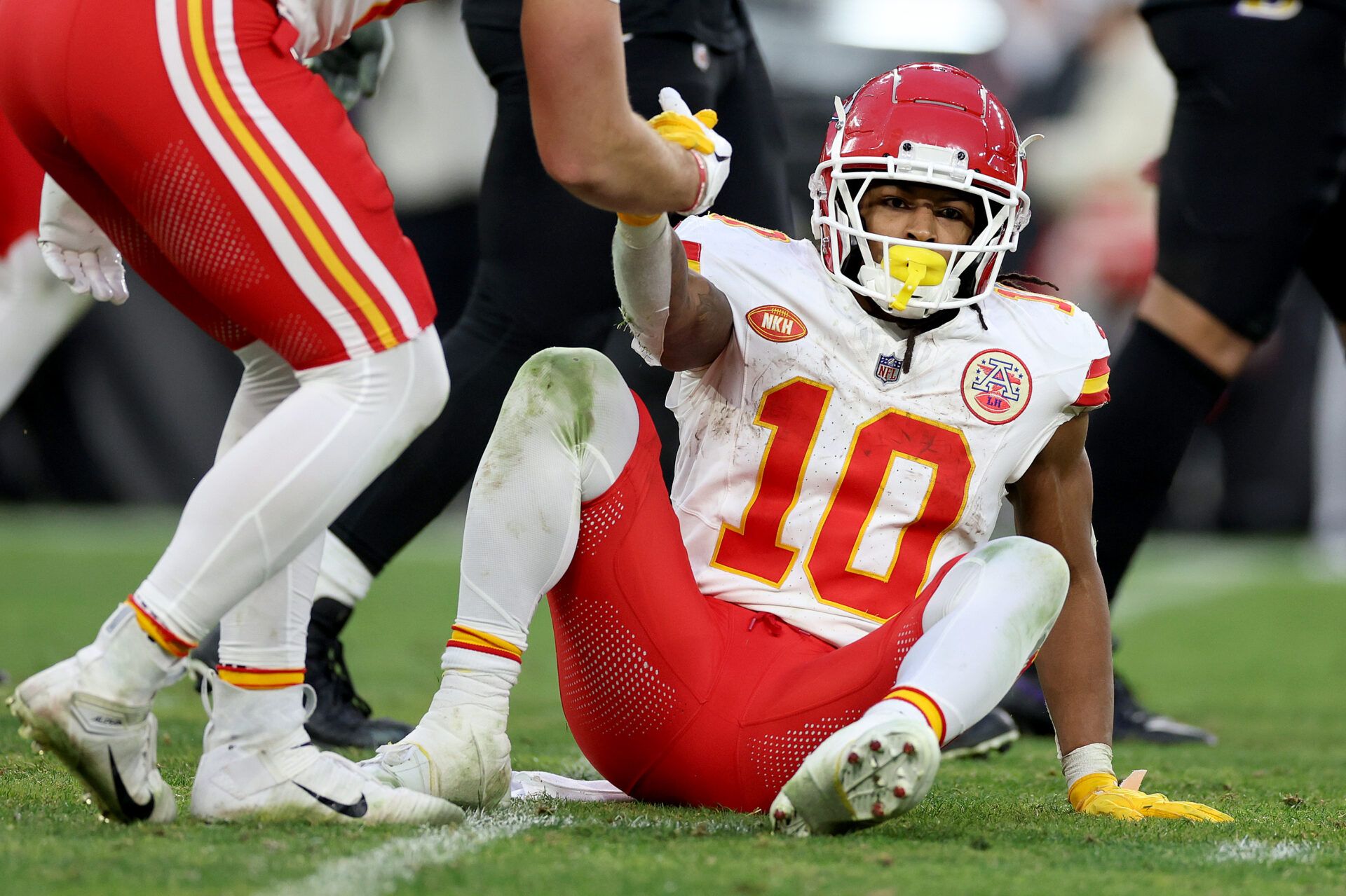 BALTIMORE, MARYLAND - JANUARY 28: Isiah Pacheco #10 of the Kansas City Chiefs is helped up during the third quarter against the Baltimore Ravens in the AFC Championship Game at M&T Bank Stadium on January 28, 2024 in Baltimore, Maryland. (Photo by Patrick Smith/Getty Images)