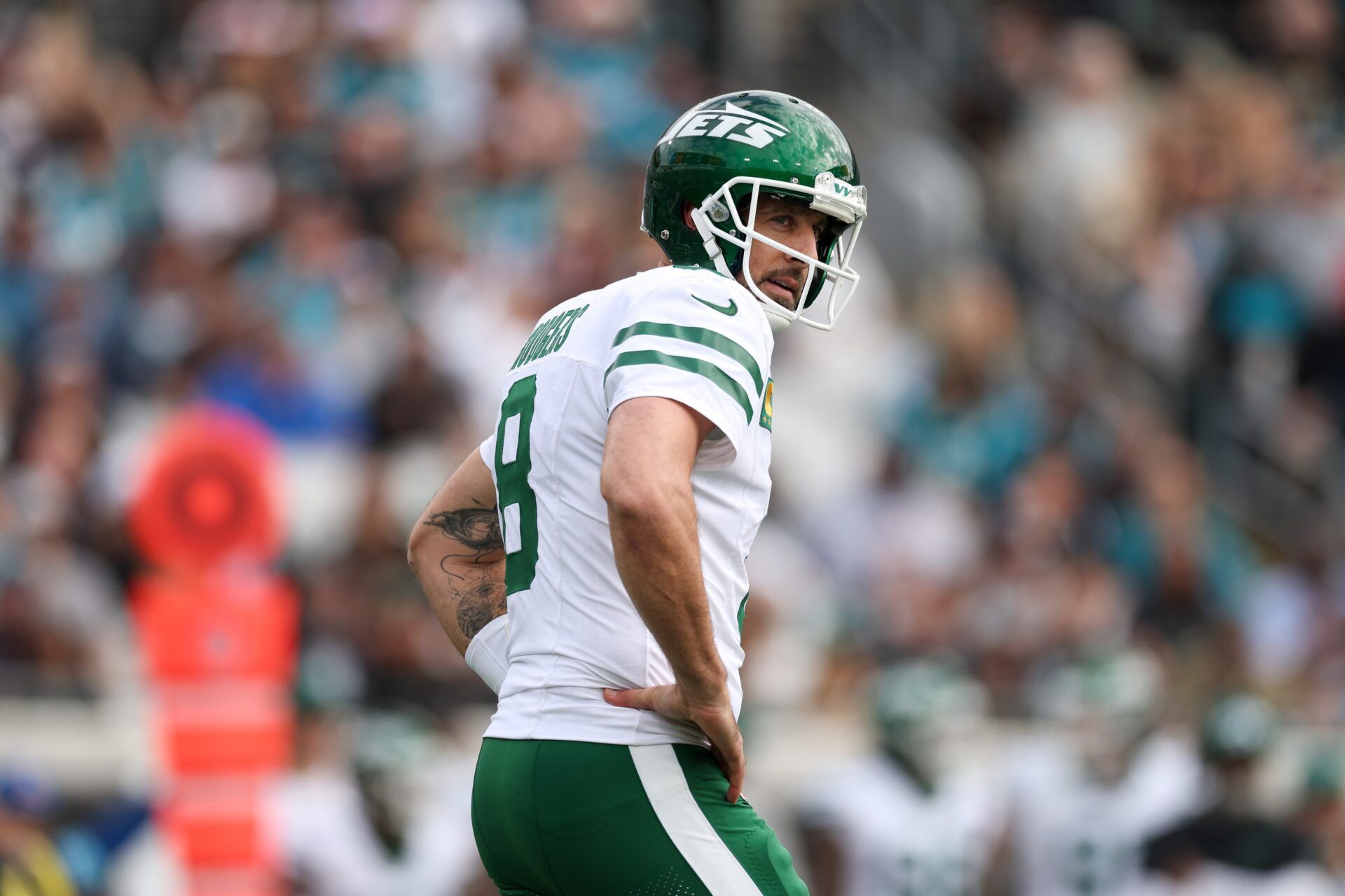 New York Jets quarterback Aaron Rodgers (8) reacts after a play against the Jacksonville Jaguars in the first quarter at EverBank Stadium.