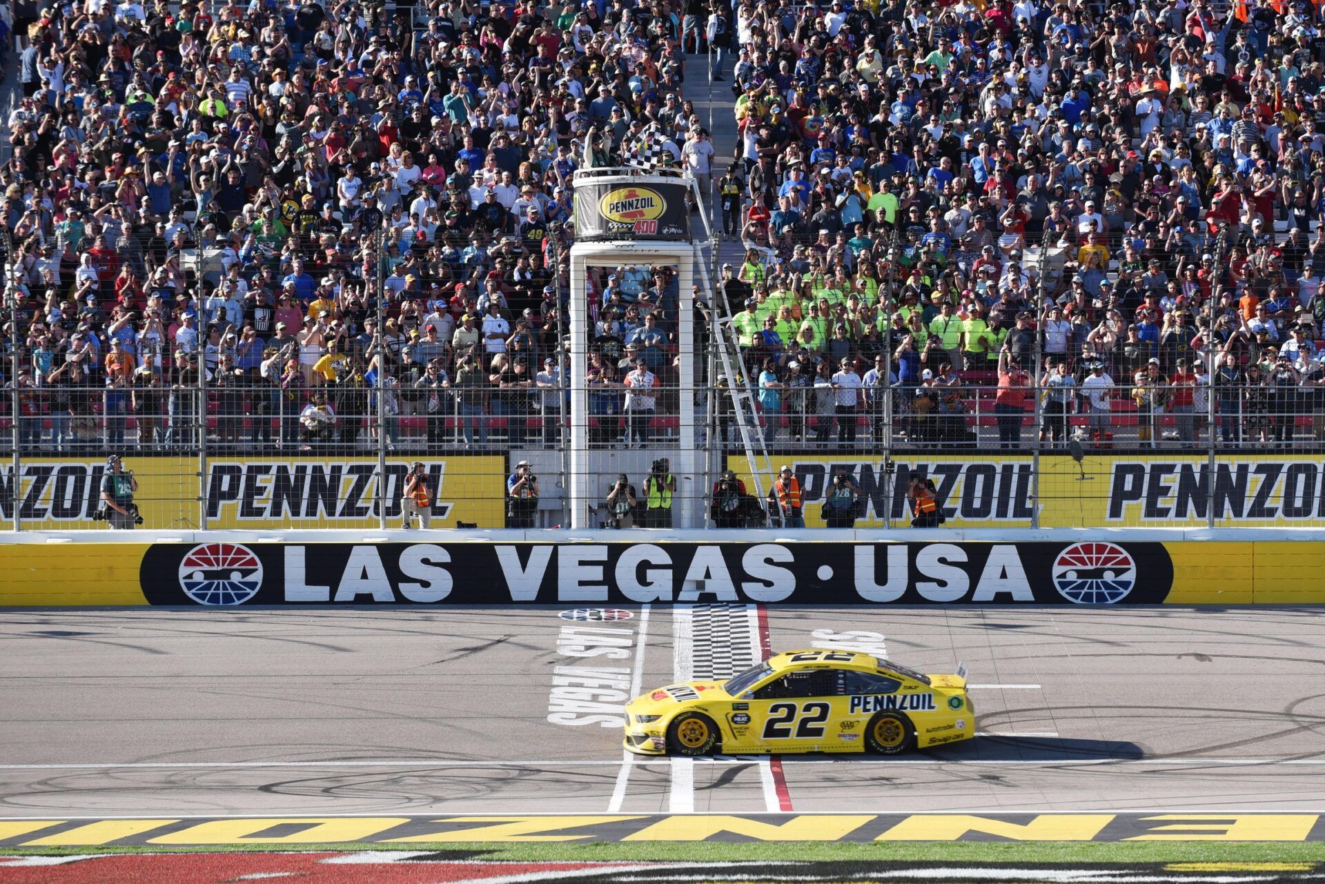 Monster Energy NASCAR Cup Series driver Joey Logano (22) crosses the finish line to win the Pennzoil 400 at Las Vegas Motor Speedway.