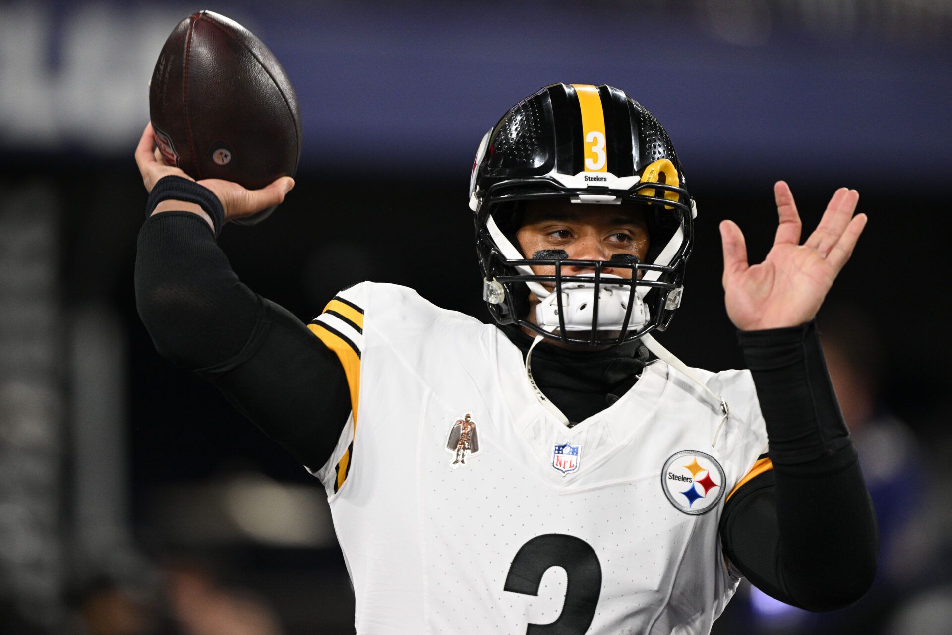 Jan 11, 2025; Baltimore, Maryland, USA; Pittsburgh Steelers quarterback Russell Wilson (3) warms up before an AFC wild card game against the Baltimore Ravens at M&T Bank Stadium. Mandatory Credit: Tommy Gilligan-Imagn Images