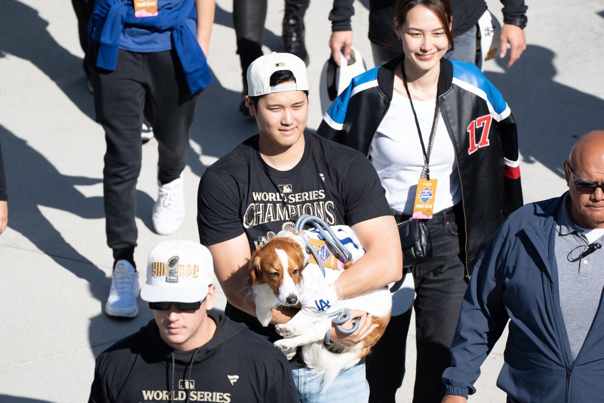 Los Angeles Dodger Shohei Ohtani, wife Mamiko Tanaka and dog Decoy arrive at Dodger Stadium for the teams World Series Championship celebration.