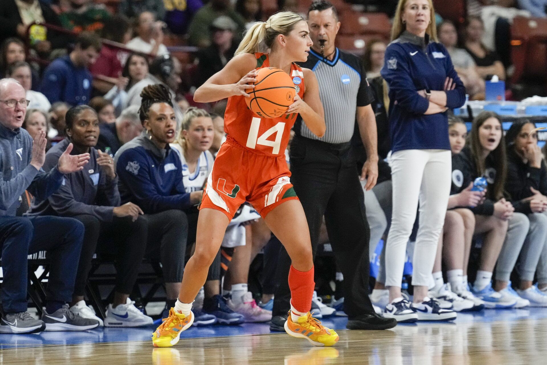 Miami Hurricanes guard Haley Cavinder (14) looks for an open teammate against the Villanova Wildcats during the NCAA Women’s Tournament at Bon Secours Wellness Arena.