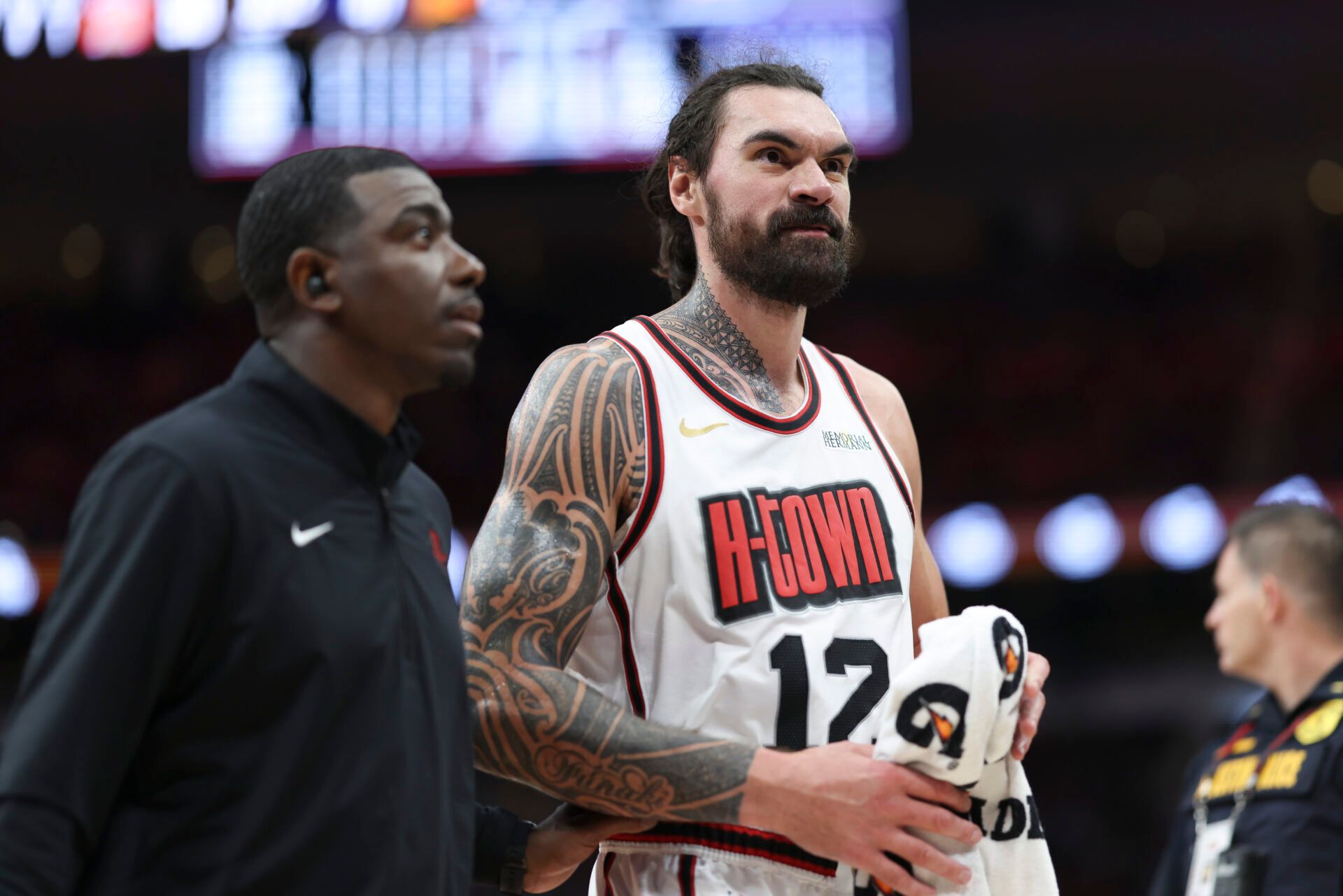 Mar 12, 2025; Houston, Texas, USA; Houston Rockets center Steven Adams (12) walks off the court after being ejected after a fight with Mason Plumlee during the second quarter against the Phoenix Suns at Toyota Center. Mandatory Credit: Troy Taormina-Imagn Images