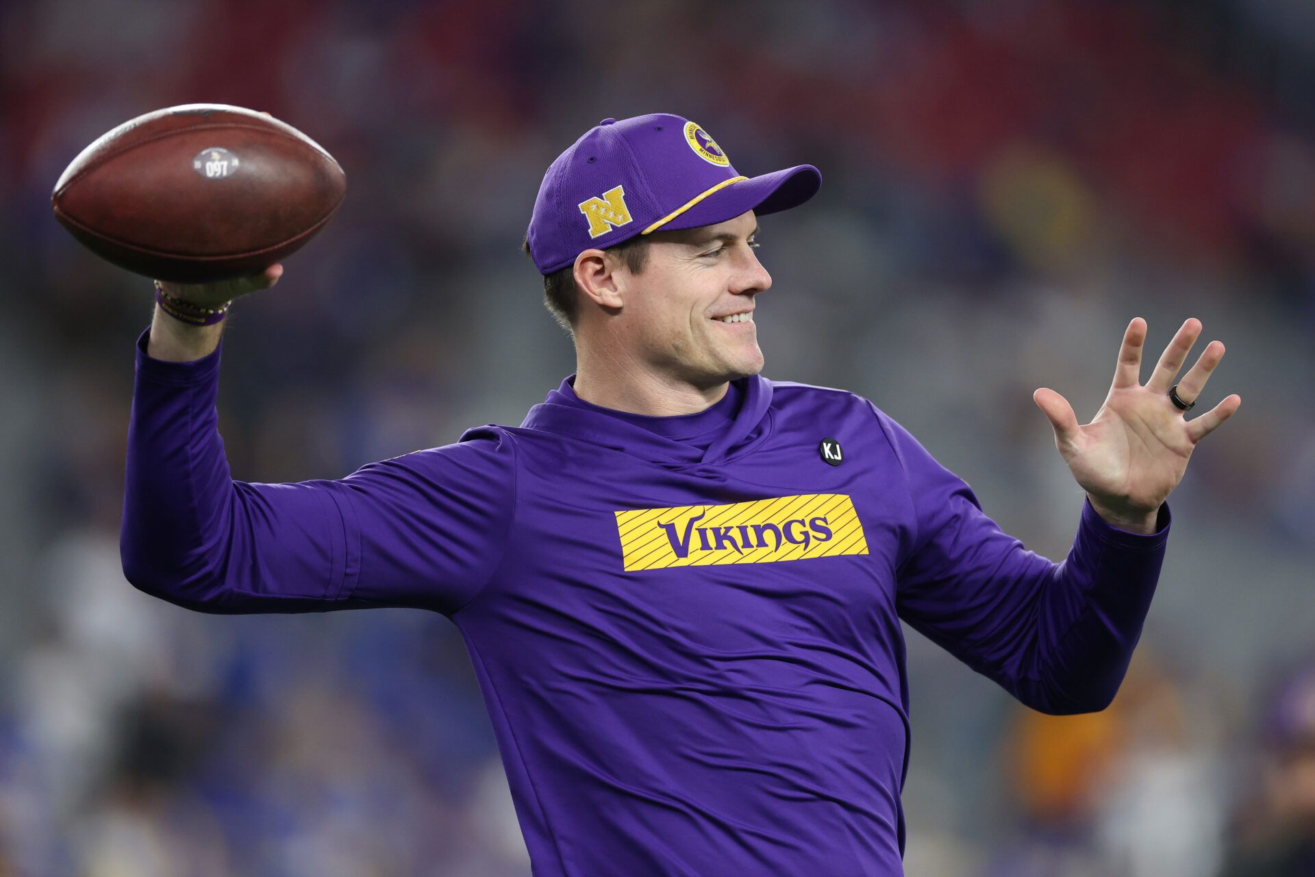 GLENDALE, ARIZONA - JANUARY 13: Head coach Kevin O’Connell of the Minnesota Vikings throws the ball prior to the NFC Wild Card Playoff game against the Los Angeles Rams at State Farm Stadium on January 13, 2025 in Glendale, Arizona. (Photo by Christian Petersen/Getty Images)