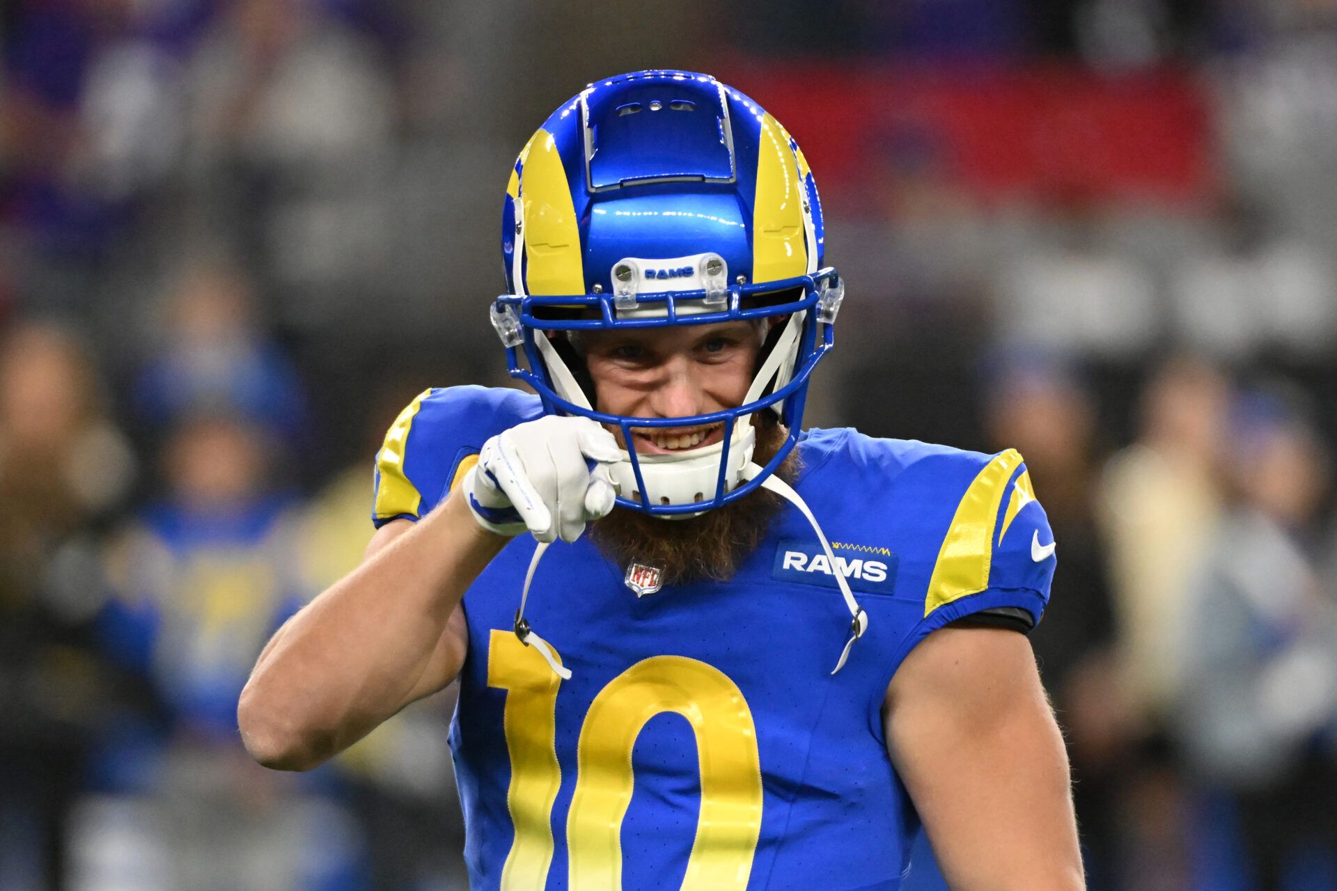 GLENDALE, ARIZONA - JANUARY 13: Cooper Kupp #10 of the Los Angeles Rams warms up prior to the game against the Minnesota Vikings during the NFC Wild Card Playoff at State Farm Stadium on January 13, 2025 in Glendale, Arizona. (Photo by Norm Hall/Getty Images)