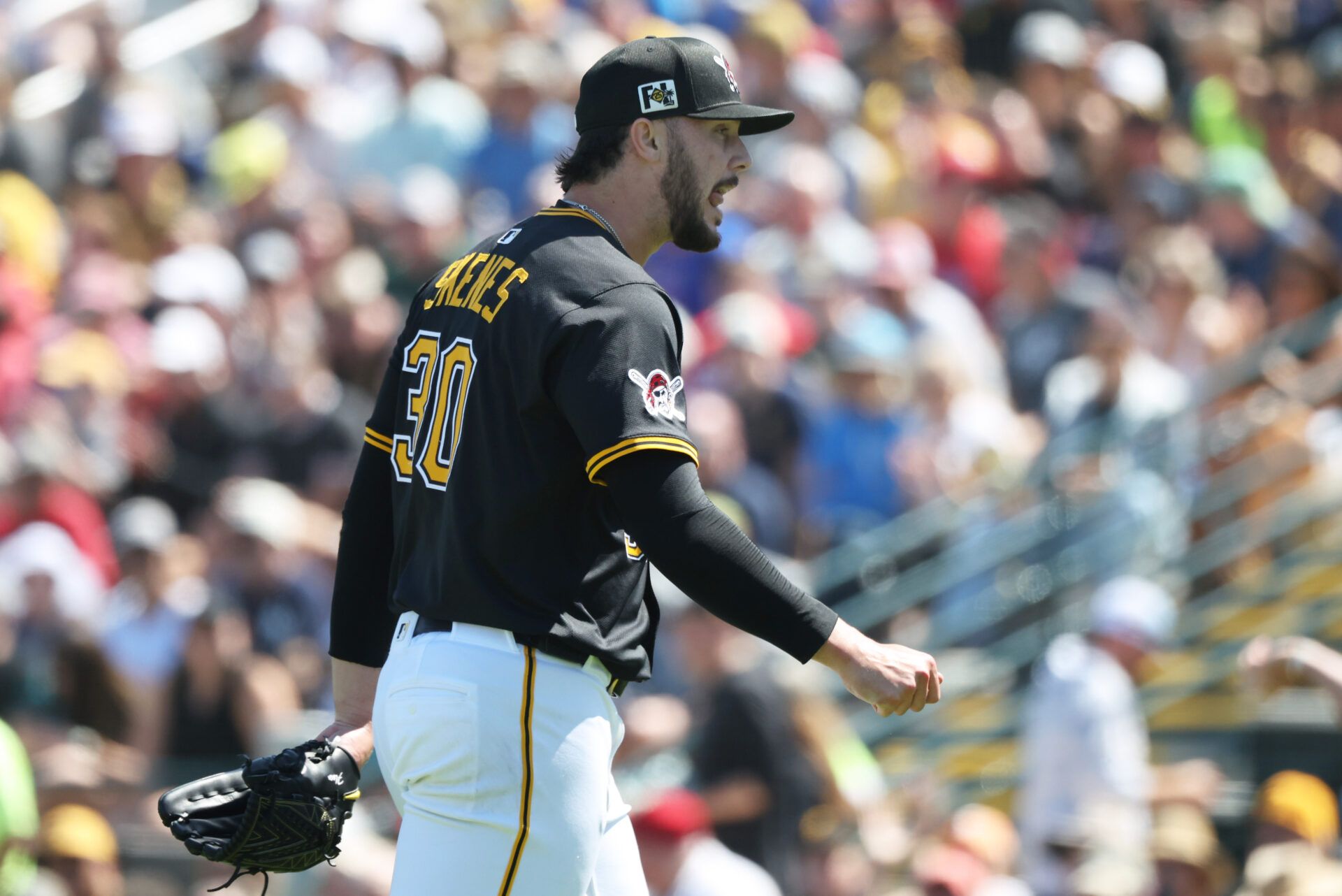 Mar 11, 2025; Bradenton, Florida, USA; Pittsburgh Pirates starting pitcher Paul Skenes (30) walks back to the dugout at the end of the third inning against the New York Yankees at LECOM Park. Mandatory Credit: Kim Klement Neitzel-Imagn Images