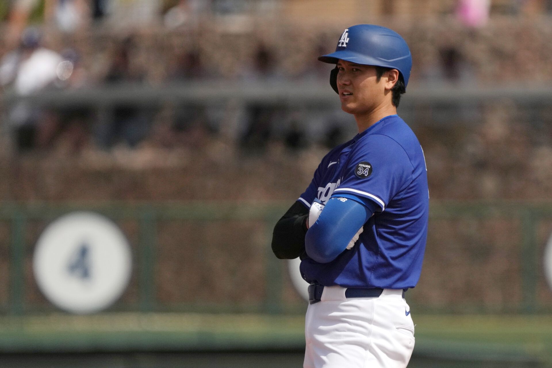 Mar 11, 2025; Phoenix, Arizona, USA; Los Angeles Dodgers player Shohei Ohtani (17) stands on second base against the Cleveland Guardians in the first inning at Camelback Ranch-Glendale. Mandatory Credit: Rick Scuteri-Imagn Images