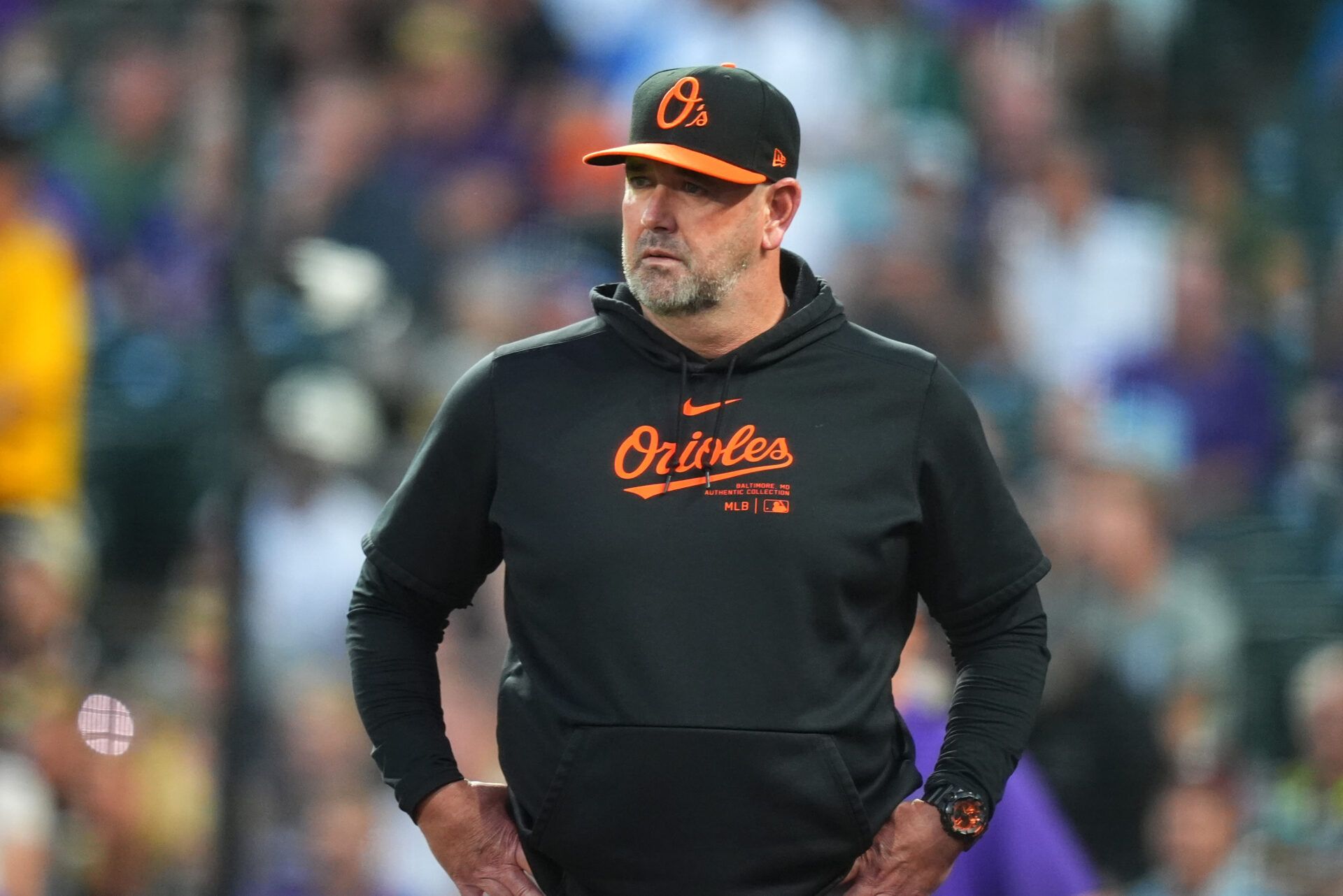 Aug 30, 2024; Denver, Colorado, USA; Baltimore Orioles manager Brandon Hyde (18) looks on during the fourth inning against the Colorado Rockies at Coors Field. Mandatory Credit: Ron Chenoy-USA TODAY Sports