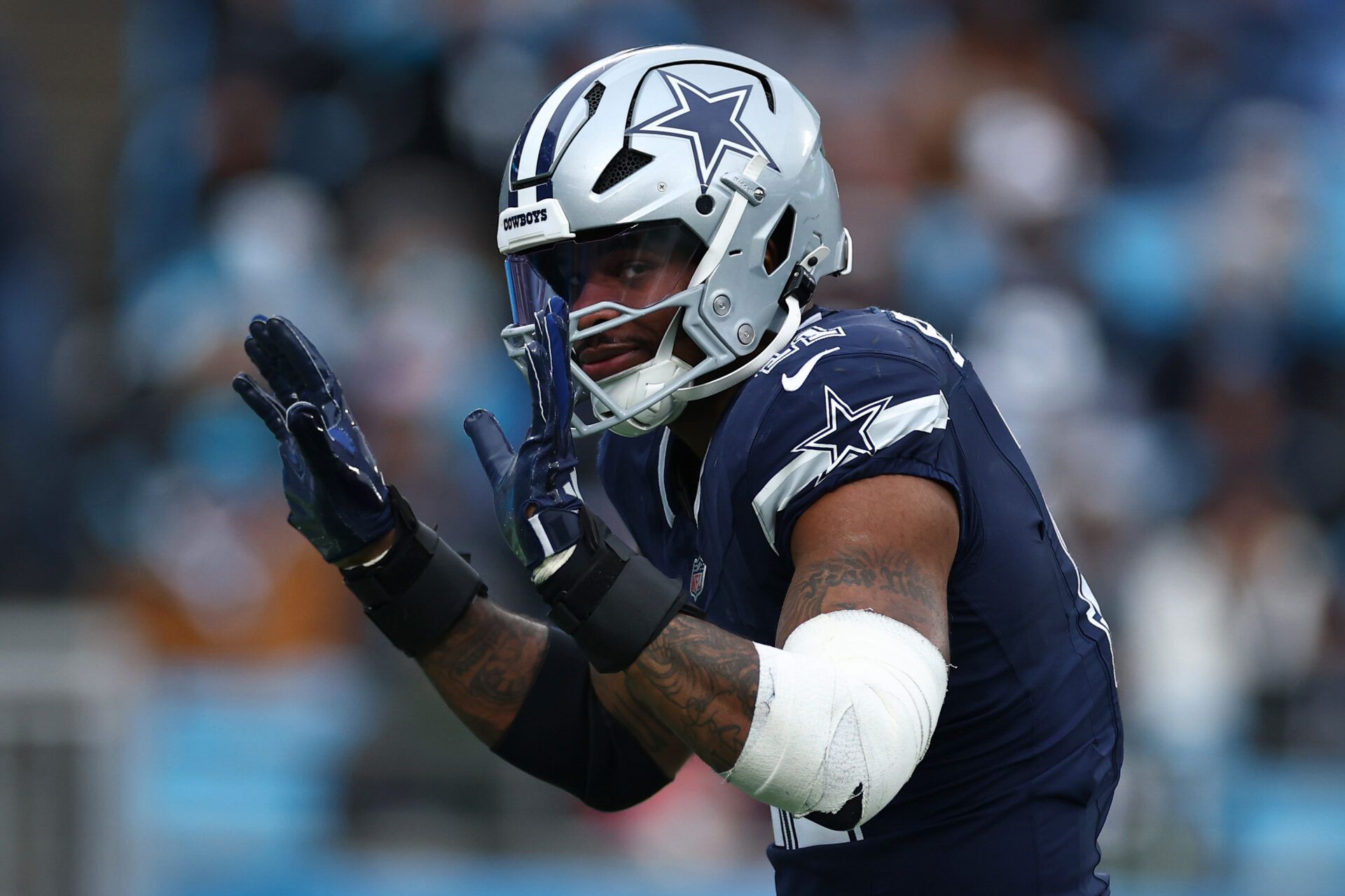 CHARLOTTE, NORTH CAROLINA - DECEMBER 15: Micah Parsons #11 of the Dallas Cowboys reacts after sacking Bryce Young #9 of the Carolina Panthers during the second half of the game at Bank of America Stadium on December 15, 2024 in Charlotte, North Carolina. (Photo by Jared C. Tilton/Getty Images)