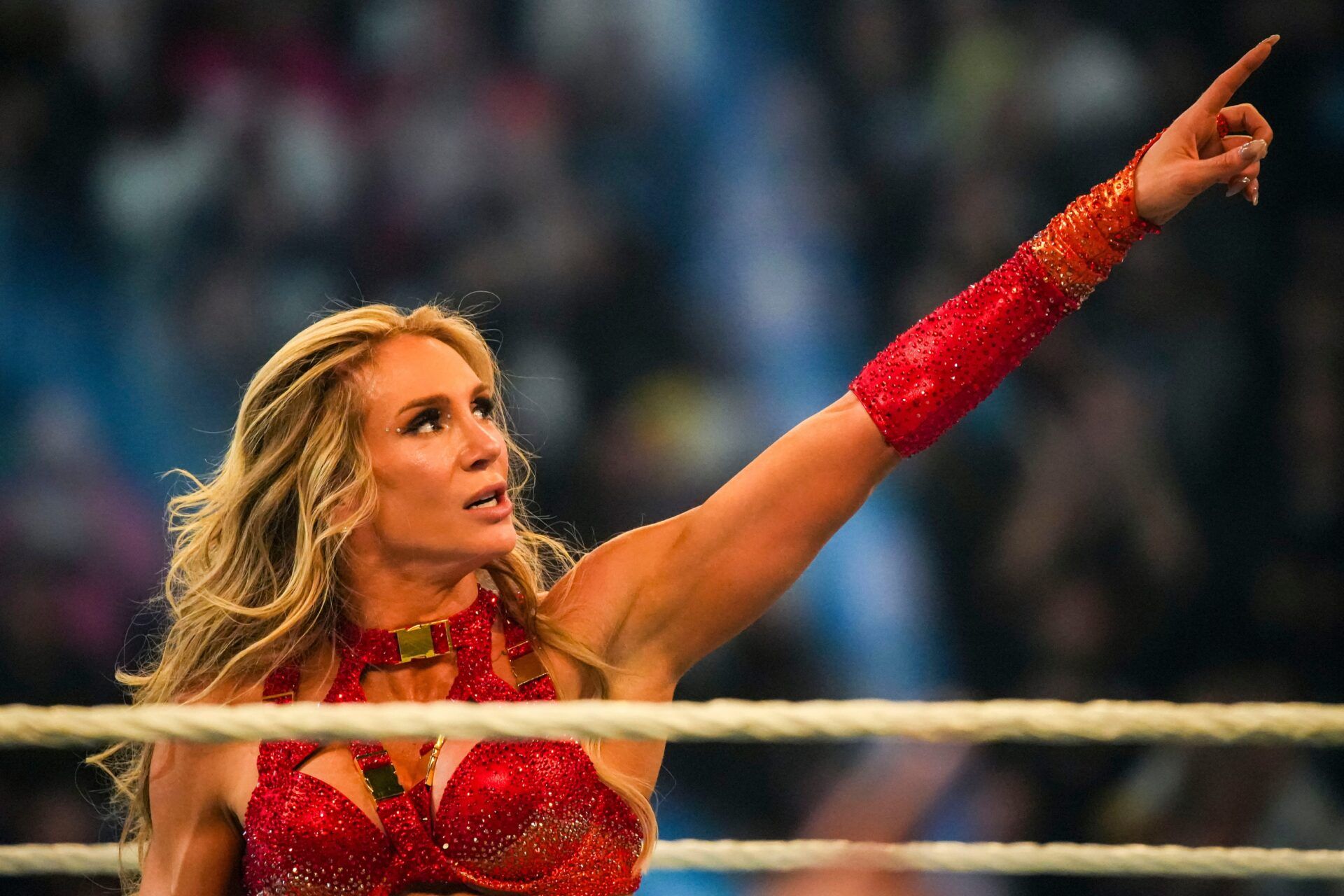 Charlotte Flair celebrates winning Saturday, Feb. 1, 2025, during the WWE Royal Rumble at Lucas Oil Stadium in Indianapolis.