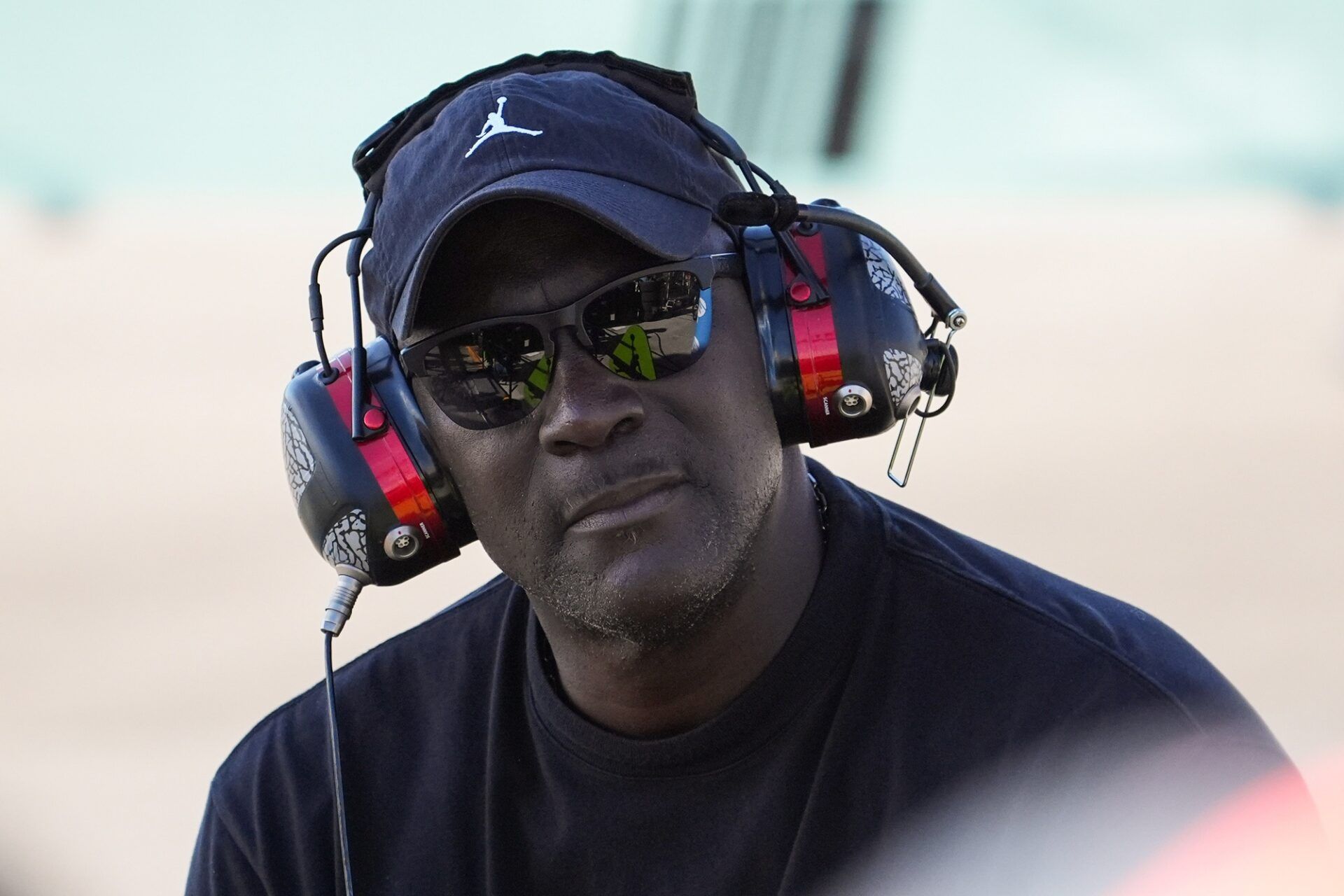 23XI team owner Michael Jordan watches during the Straight Talk Wireless 400 at Homestead-Miami Speedway.