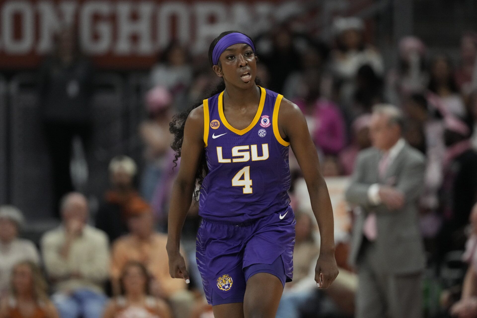 Louisiana State Lady Tigers guard Flau'jae Johnson (4) reacts after scoring during the first half against the Texas Longhorns at Moody Center.