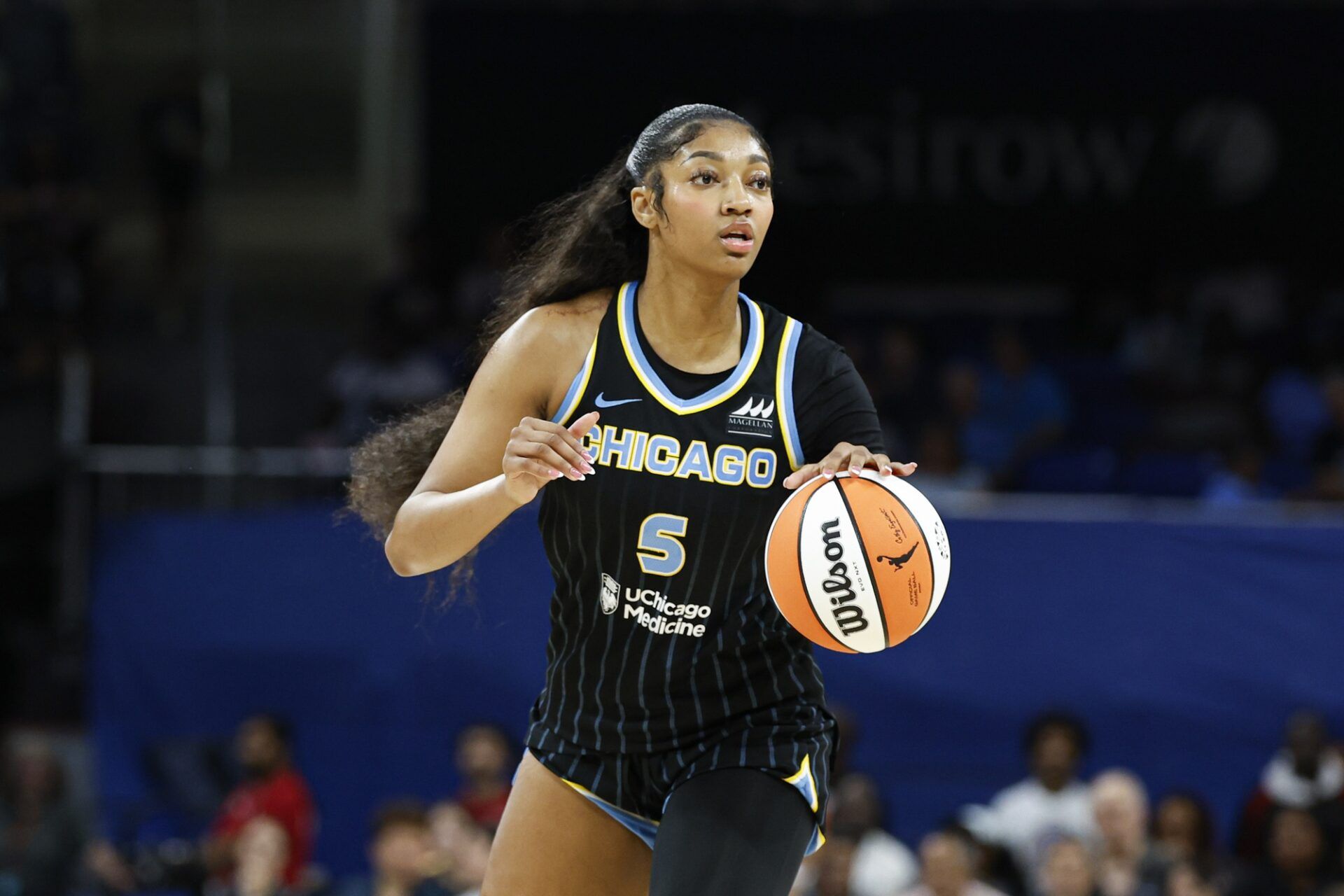 Chicago Sky forward Angel Reese (5) looks to pass the ball against the Las Vegas Aces during the first half at Wintrust Arena.