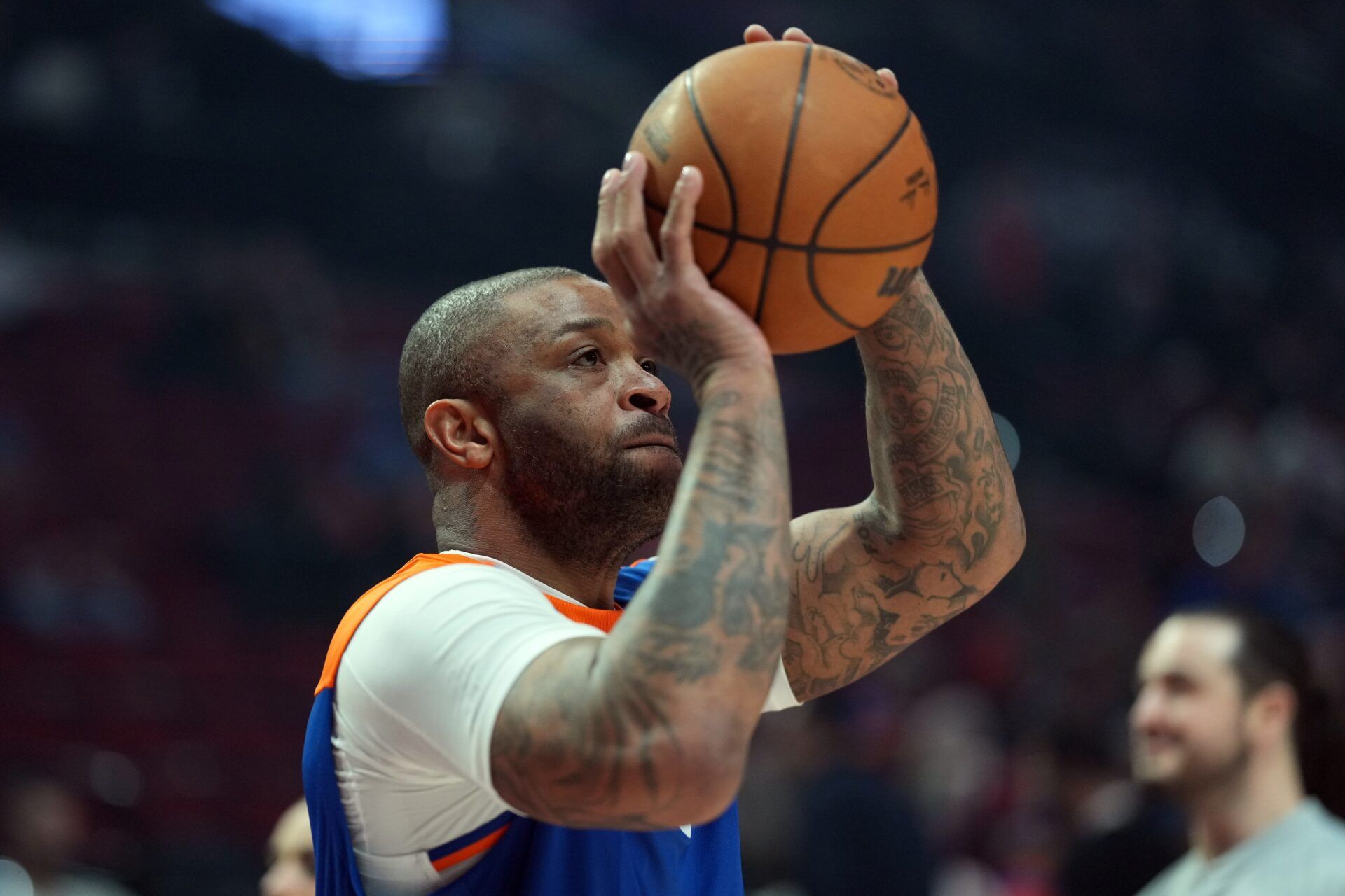 New York Knicks power forward P.J. Tucker (17) warms up before the game against the Portland Trail Blazers at Moda Center.