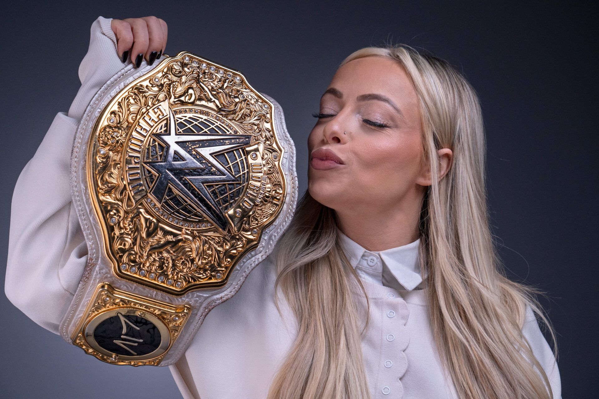 Following a brutal street fight at a Germany house show with Rhea Ripley, Liv Morgan tweeted out a photo of the violent aftermath.