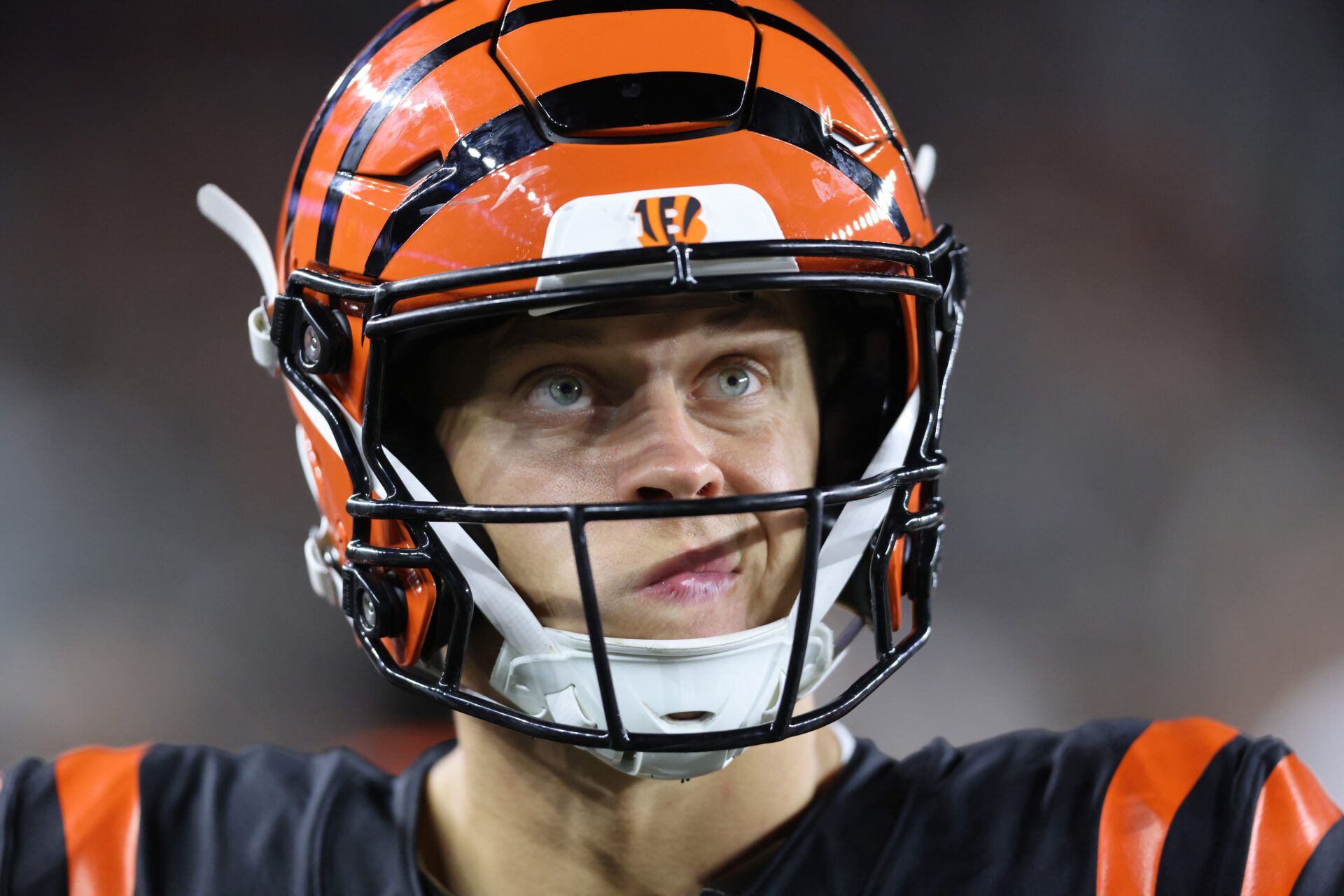 Sep 23, 2024; Cincinnati, Ohio, USA; Cincinnati Bengals quarterback Joe Burrow (9) reacts as he looks at the scoreboard during the fourth quarter against the Washington Commanders at Paycor Stadium. Mandatory Credit: Joseph Maiorana-Imagn Images