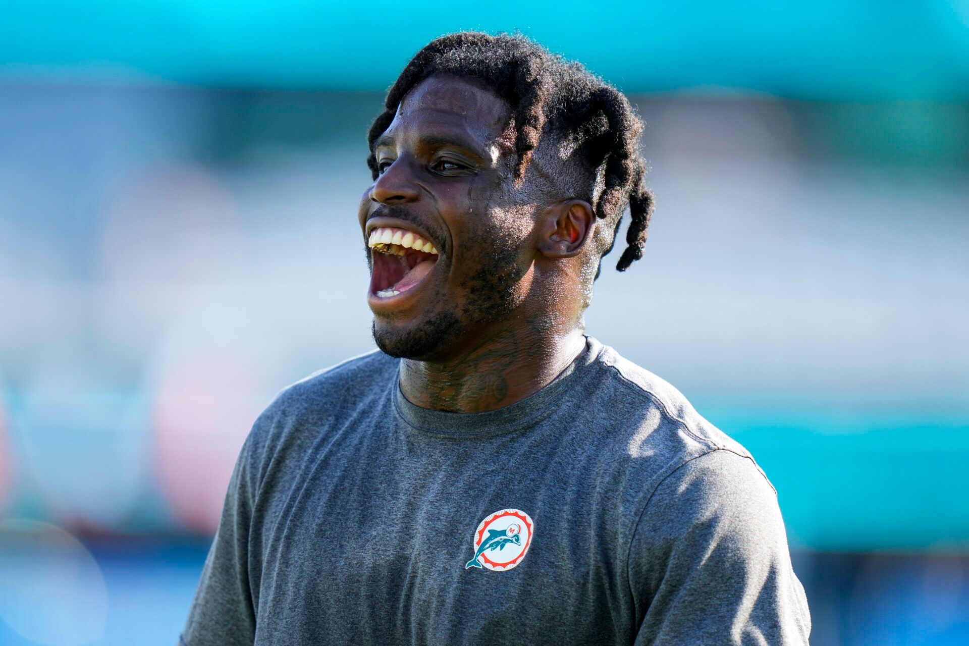 JACKSONVILLE, FLORIDA - AUGUST 26: Tyreek Hill #10 of the Miami Dolphins warms up prior to a preseason game against the Jacksonville Jaguars at EverBank Stadium on August 26, 2023 in Jacksonville, Florida. (Photo by Rich Storry/Getty Images)