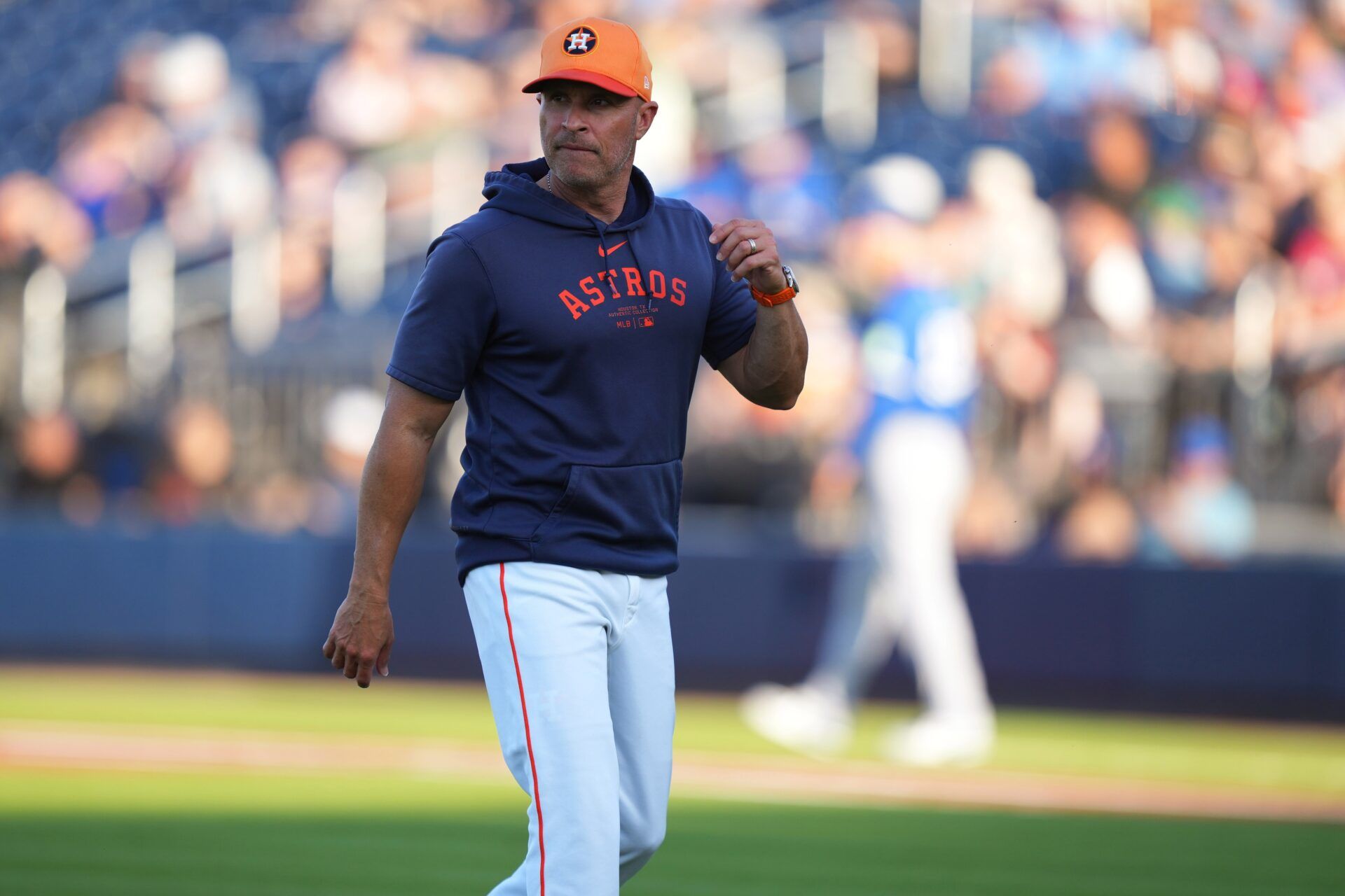 Houston Astros manager Joe Espada (19) walks back to the dugout after making a pitching change in the first inning against the Toronto Blue Jays at CACTI Park of the Palm Beaches.