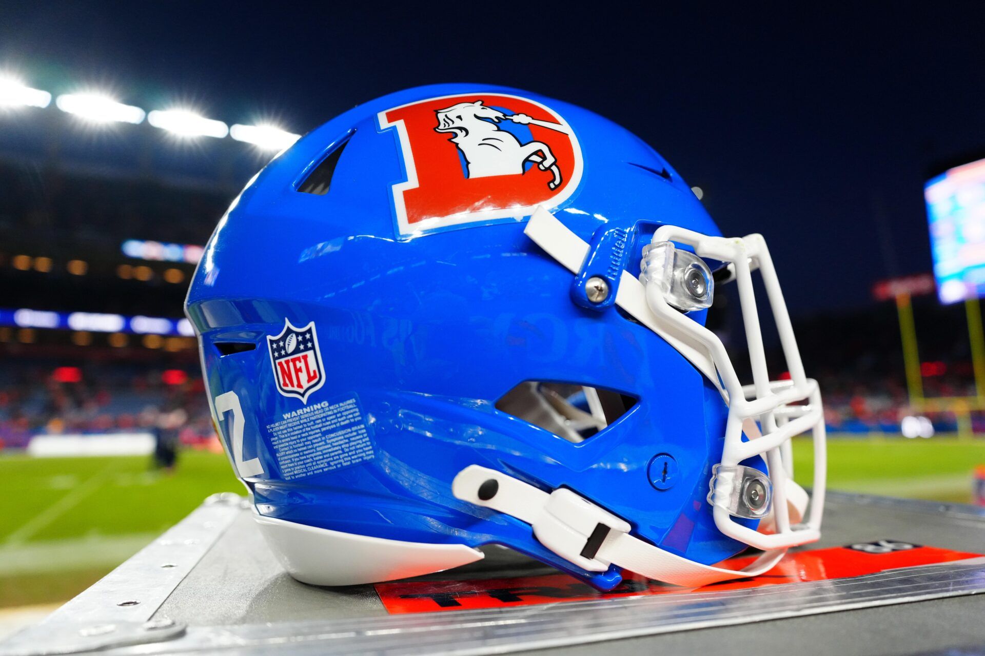 Detailed view of a Denver Broncos throwback helmet following the win against the Kansas City Chiefs at Empower Field at Mile High.