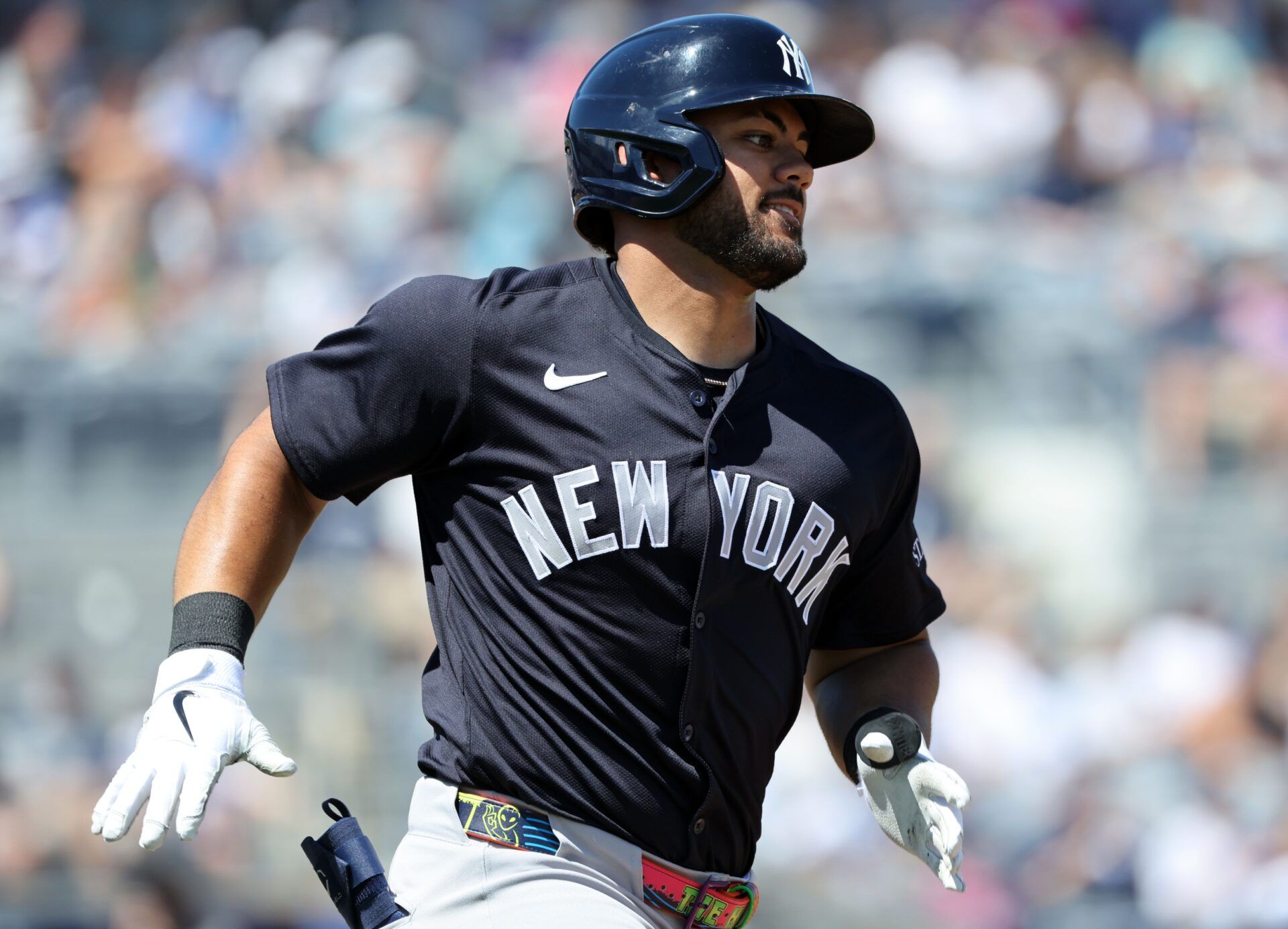 New York Yankees outfielder Jasson Dominguez (24) hits a RBI single during the fifth inning against the Tampa Bay Rays at Charlotte Sports Park.