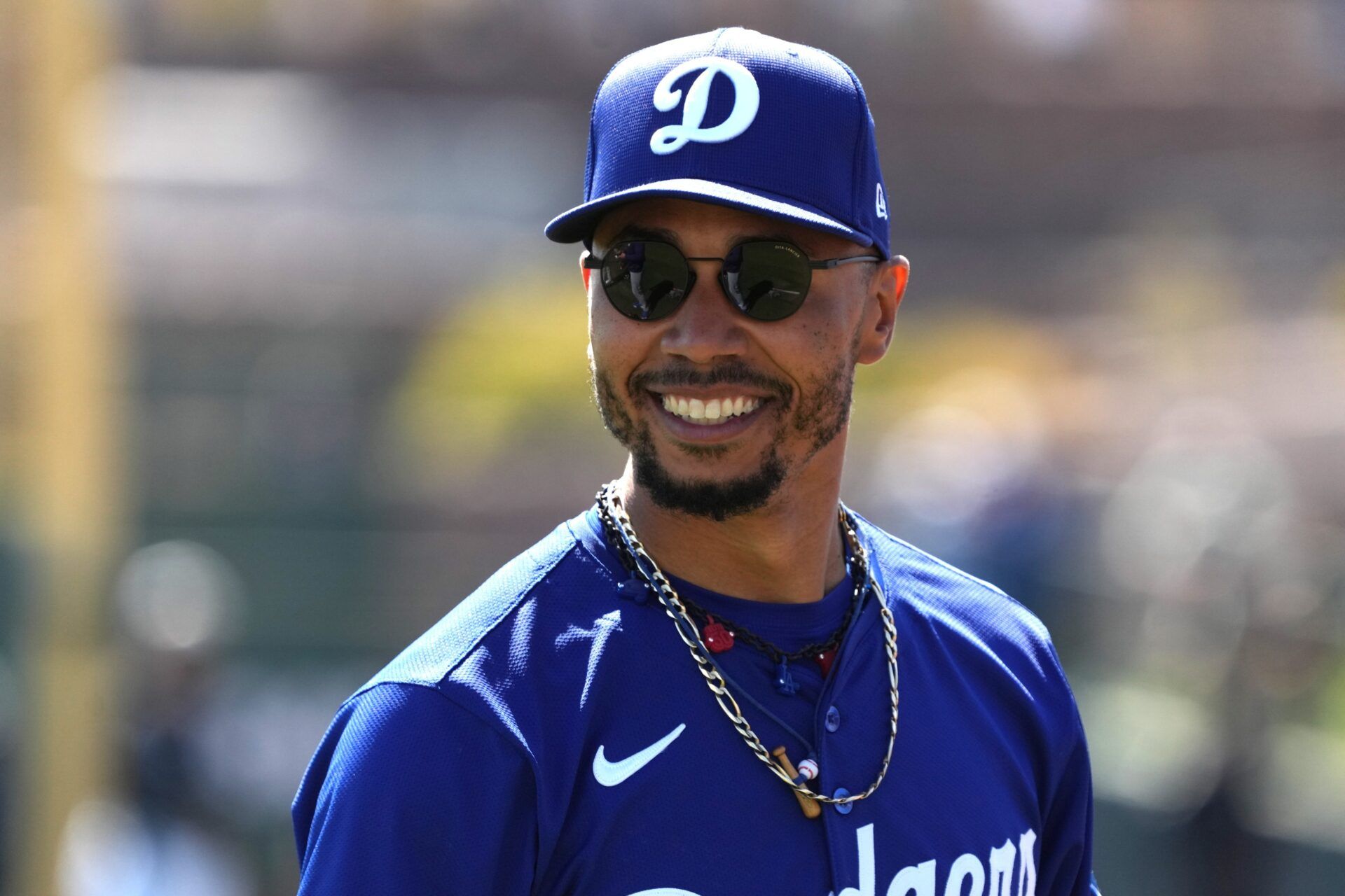 Los Angeles Dodgers shortstop Mookie Betts (50) warms up before a game against the Chicago White Sox at Camelback Ranch-Glendale.