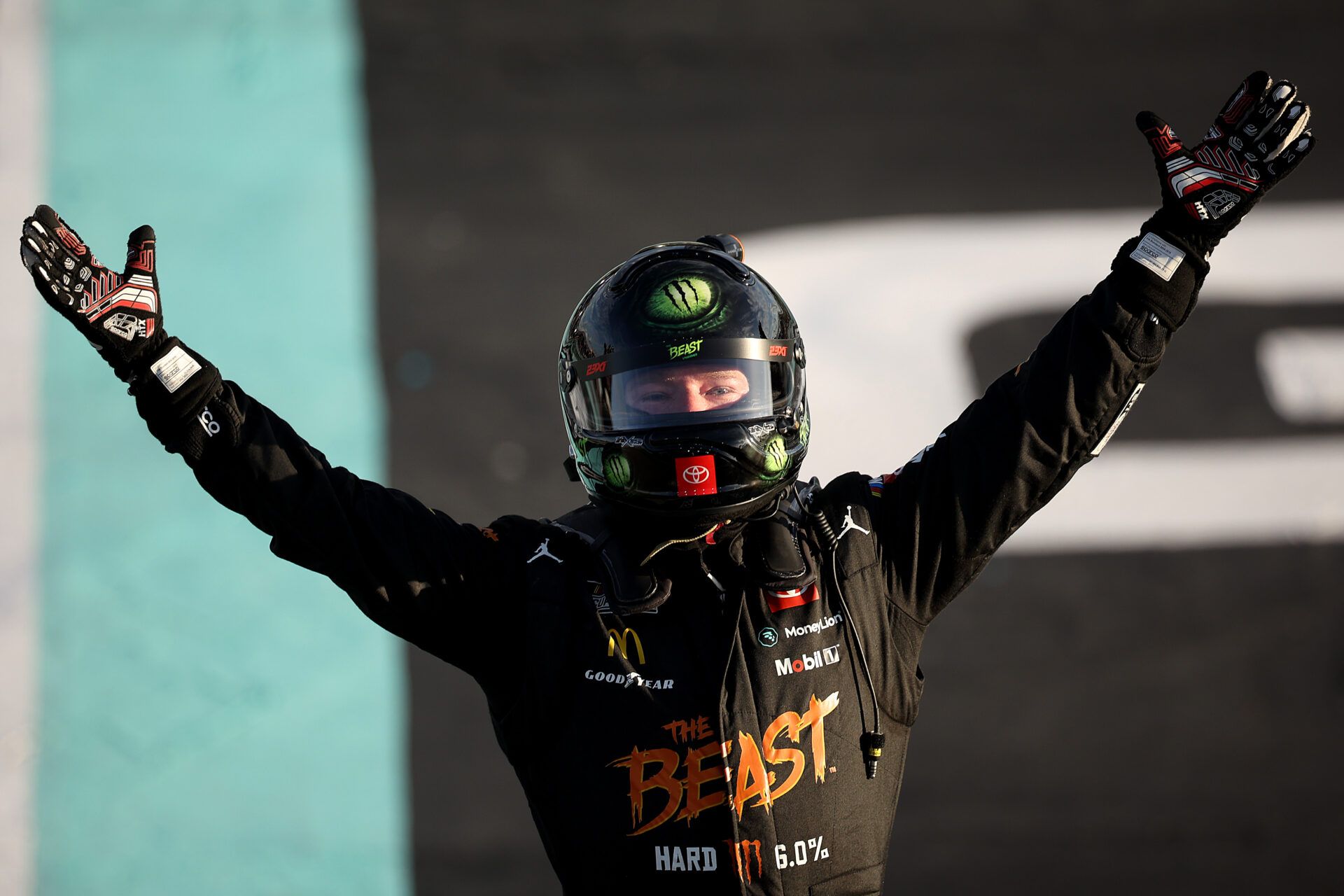 HOMESTEAD, FLORIDA - OCTOBER 27: Tyler Reddick, driver of the #45 The Beast Killer Sunrise Toyota, celebrates after winning the NASCAR Cup Series Straight Talk Wireless 400 at Homestead-Miami Speedway on October 27, 2024 in Homestead, Florida. (Photo by James Gilbert/Getty Images)