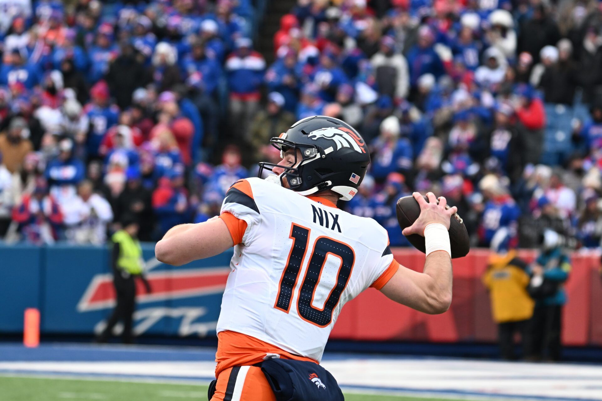 Denver Broncos quarterback Bo Nix (10) throws downfield during the first quarter against the Buffalo Bills in an AFC wild card game at Highmark Stadium.