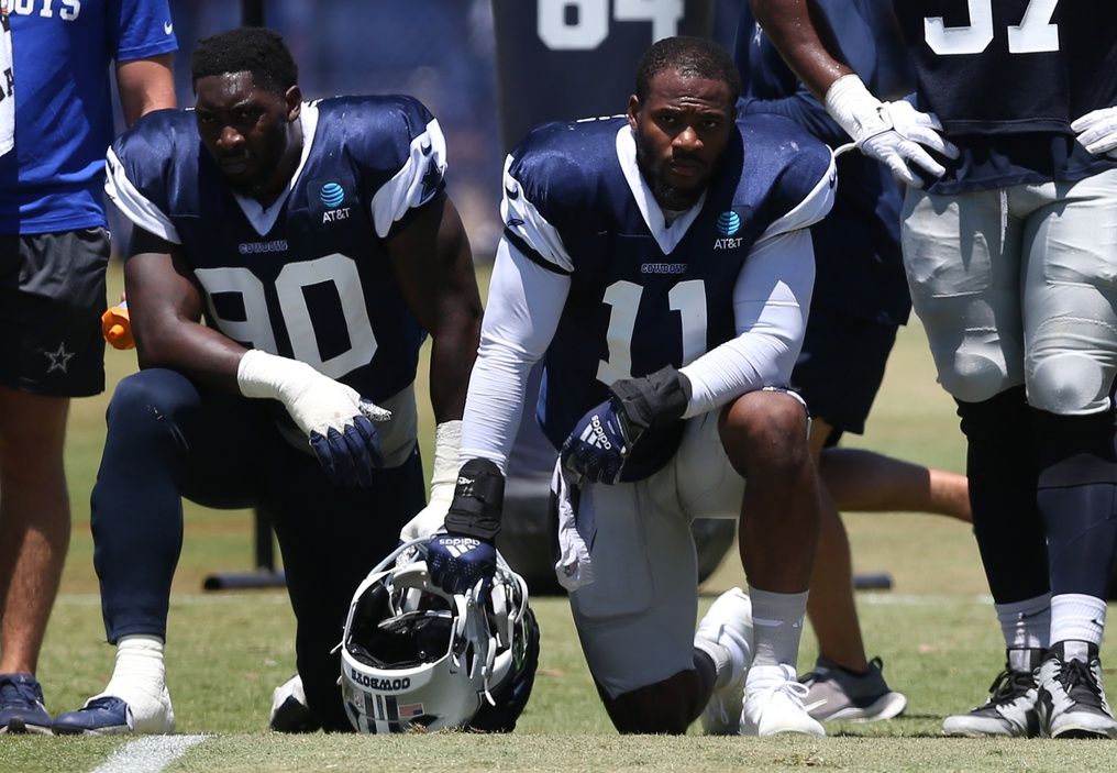 Dallas Cowboys defensive end DeMarcus Lawrence (90) and linebacker Micah Parsons (11) during training camp at the River Ridge Playing Fields in Oxnard, California.