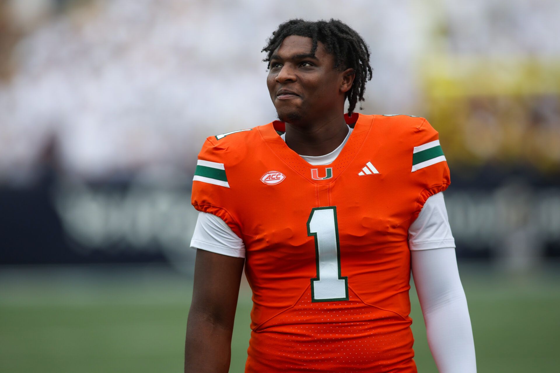 Nov 9, 2024; Atlanta, Georgia, USA; Miami Hurricanes quarterback Cam Ward (1) on the sideline against the Georgia Tech Yellow Jackets in the first quarter at Bobby Dodd Stadium at Hyundai Field. Mandatory Credit: Brett Davis-Imagn Images