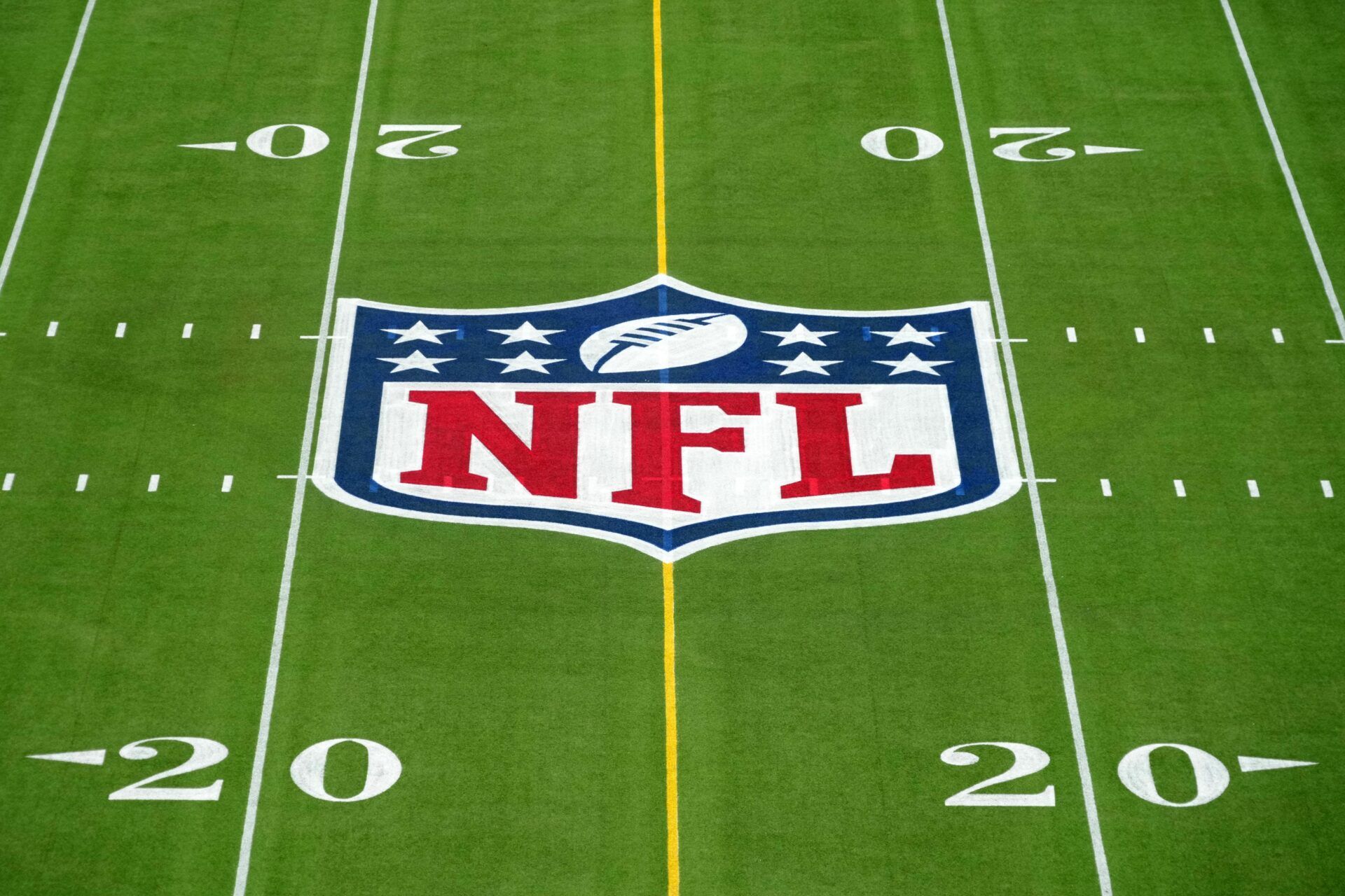 Feb 1, 2025; Orlando, FL, USA; An overall view of the NFL shield logo at midfield on the Camping World Stadium flag football field. Mandatory Credit: Kirby Lee-Imagn Images