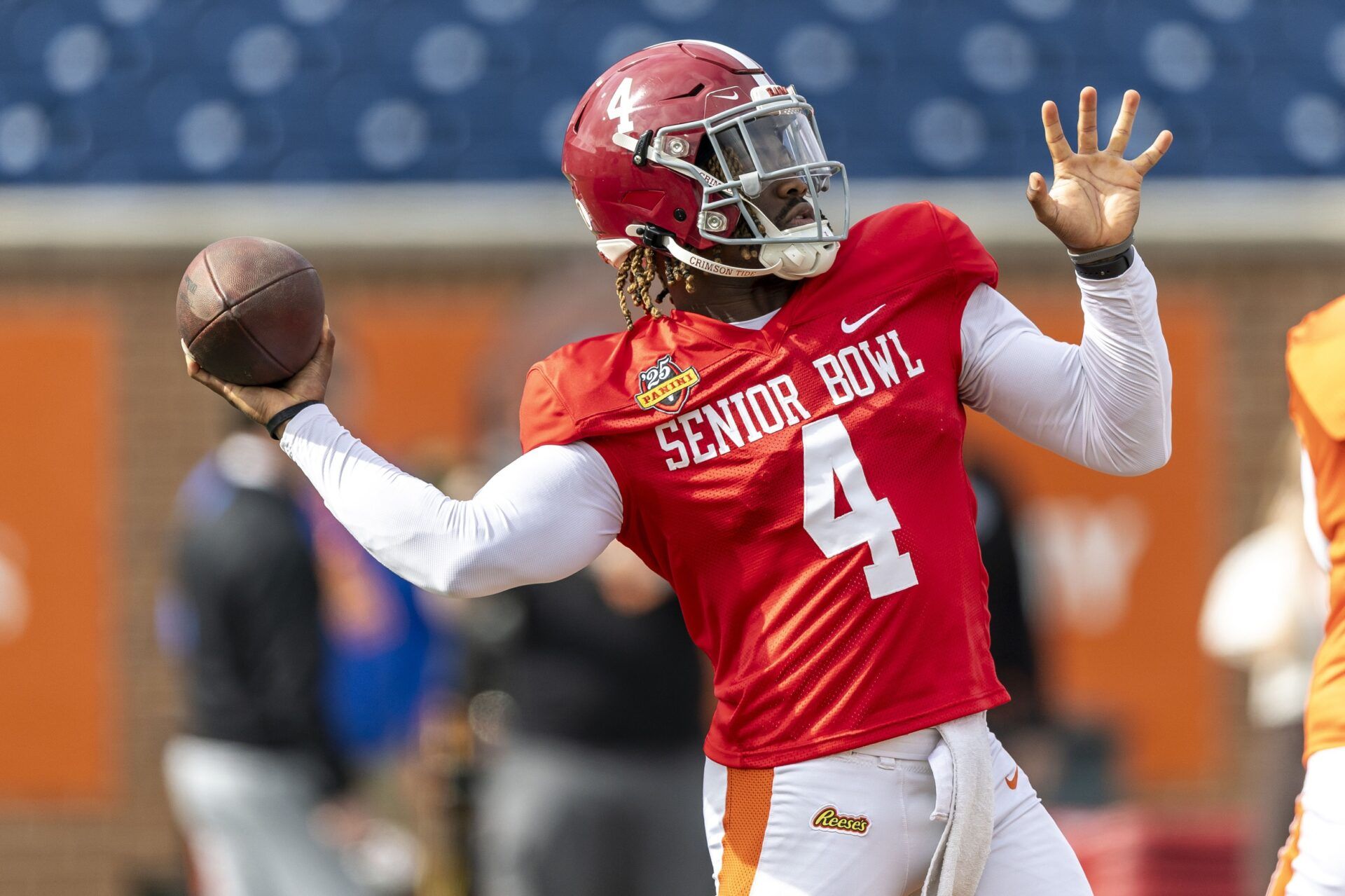 American team quarterback Jalen Milroe of Alabama (4) throws long during Senior Bowl practice for the American team at Hancock Whitney Stadium.