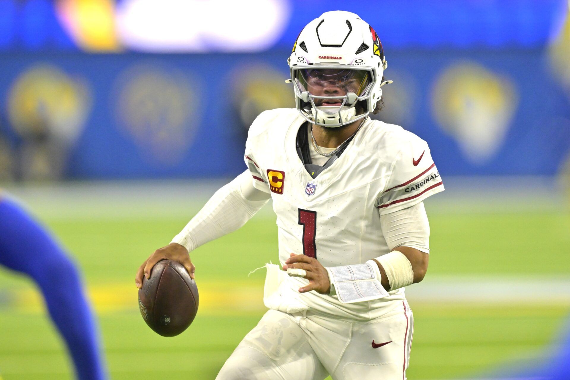 Arizona Cardinals quarterback Kyler Murray (1) scrambles for a first down in the second half against the Los Angeles Rams at SoFi Stadium.