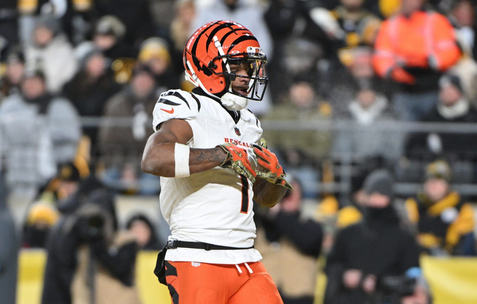 Cincinnati Bengals wide receiver Ja'Marr Chase (1) celebrates after a touchdown pass against the Pittsburgh Steelers during the first quarter at Acrisure Stadium.