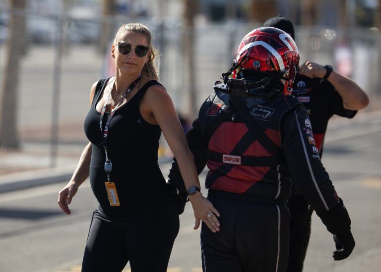 NHRA pregnant top fuel driver Leah Pruett with husband Tony Stewart during qualifying for the Ford Performance Nationals at The Strip at Las Vegas Motor Speedway.