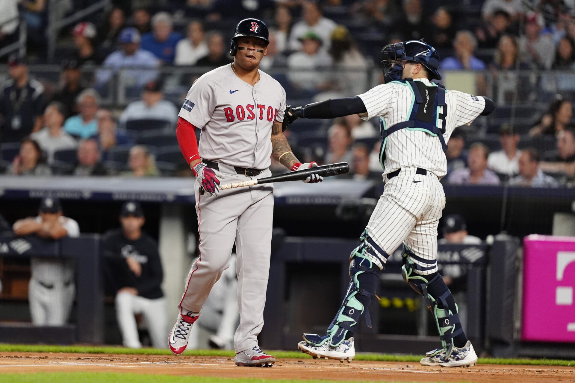 Boston Red Sox third baseman Rafael Devers (11) after an at bat against the New York Yankees during the first inning at Yankee Stadium.