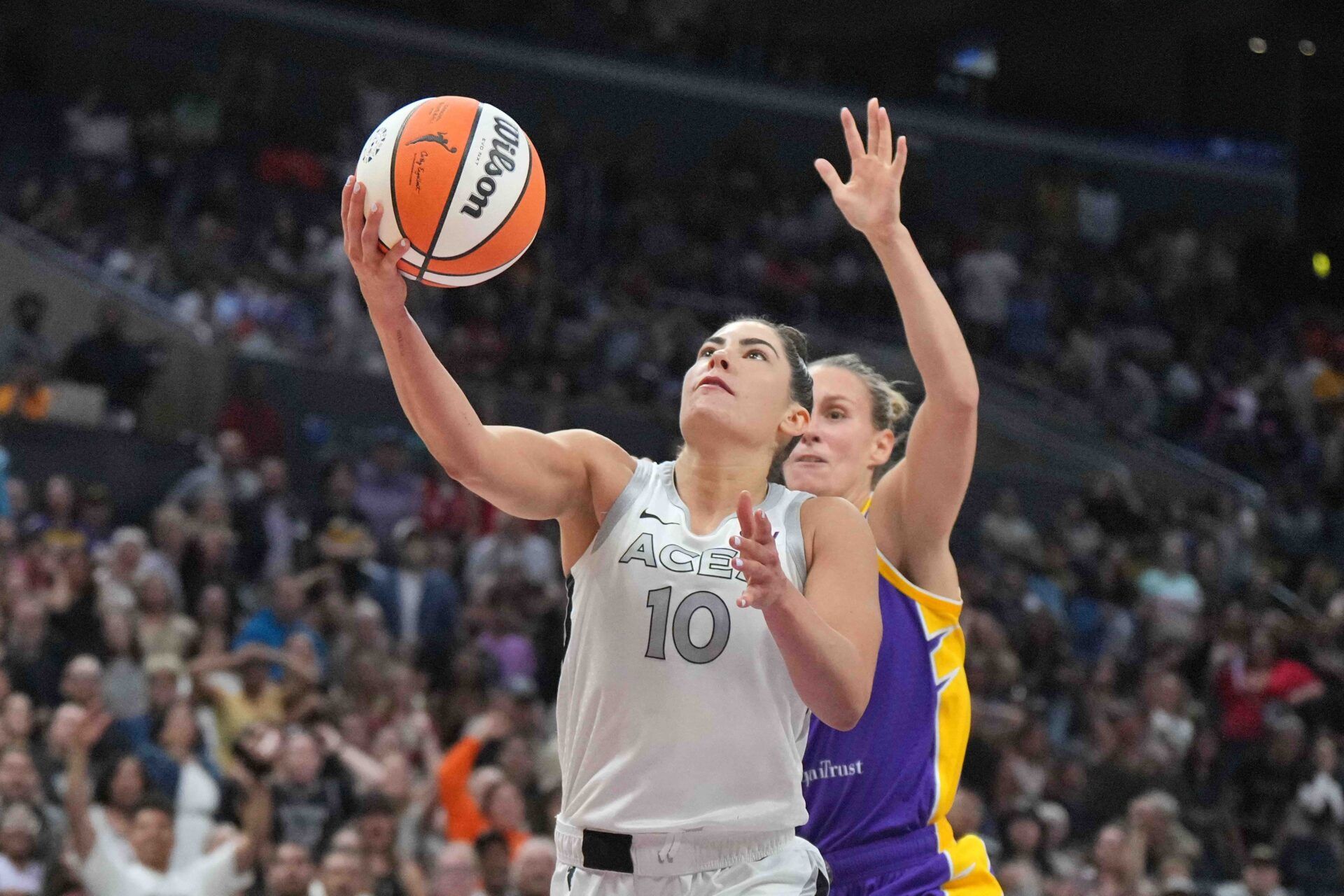 Las Vegas Aces guard Kelsey Plum (10) shoots the ball against LA Sparks forward Stephanie Talbot (7) in the second half at Crypto.com Arena.