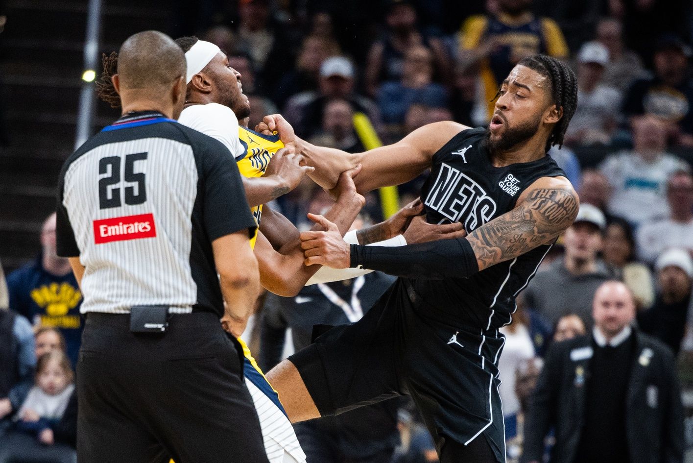 Indiana Pacers center Myles Turner (33) and Brooklyn Nets forward Trendon Watford (9) get into a fight leading to Watford being ejected in the second half at Gainbridge Fieldhouse.