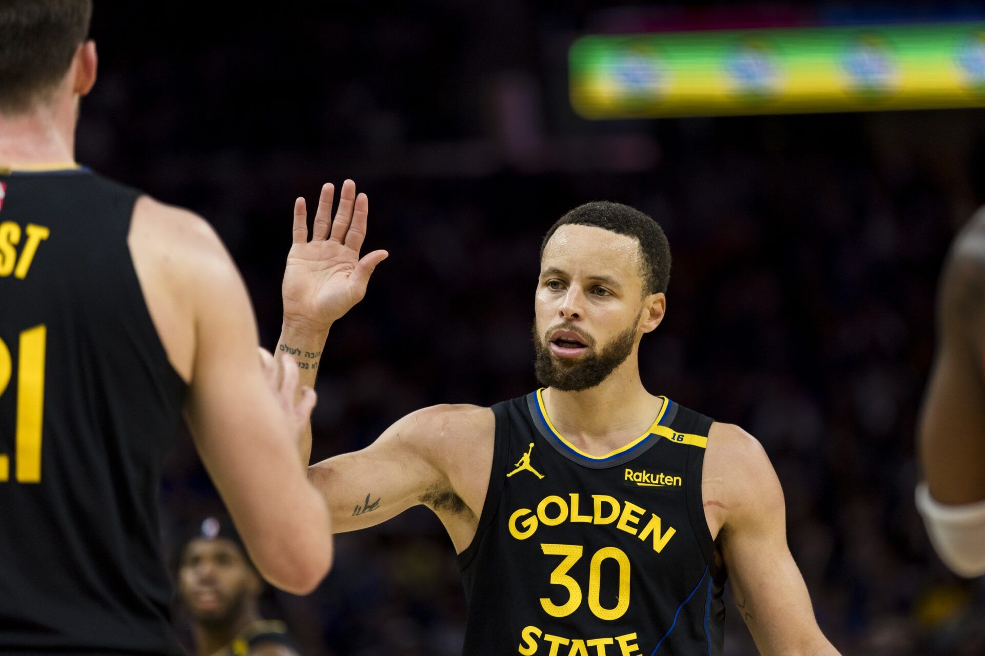 Golden State Warriors guard Stephen Curry (30) reacts during the third quarter against the Toronto Raptors at Chase Center.