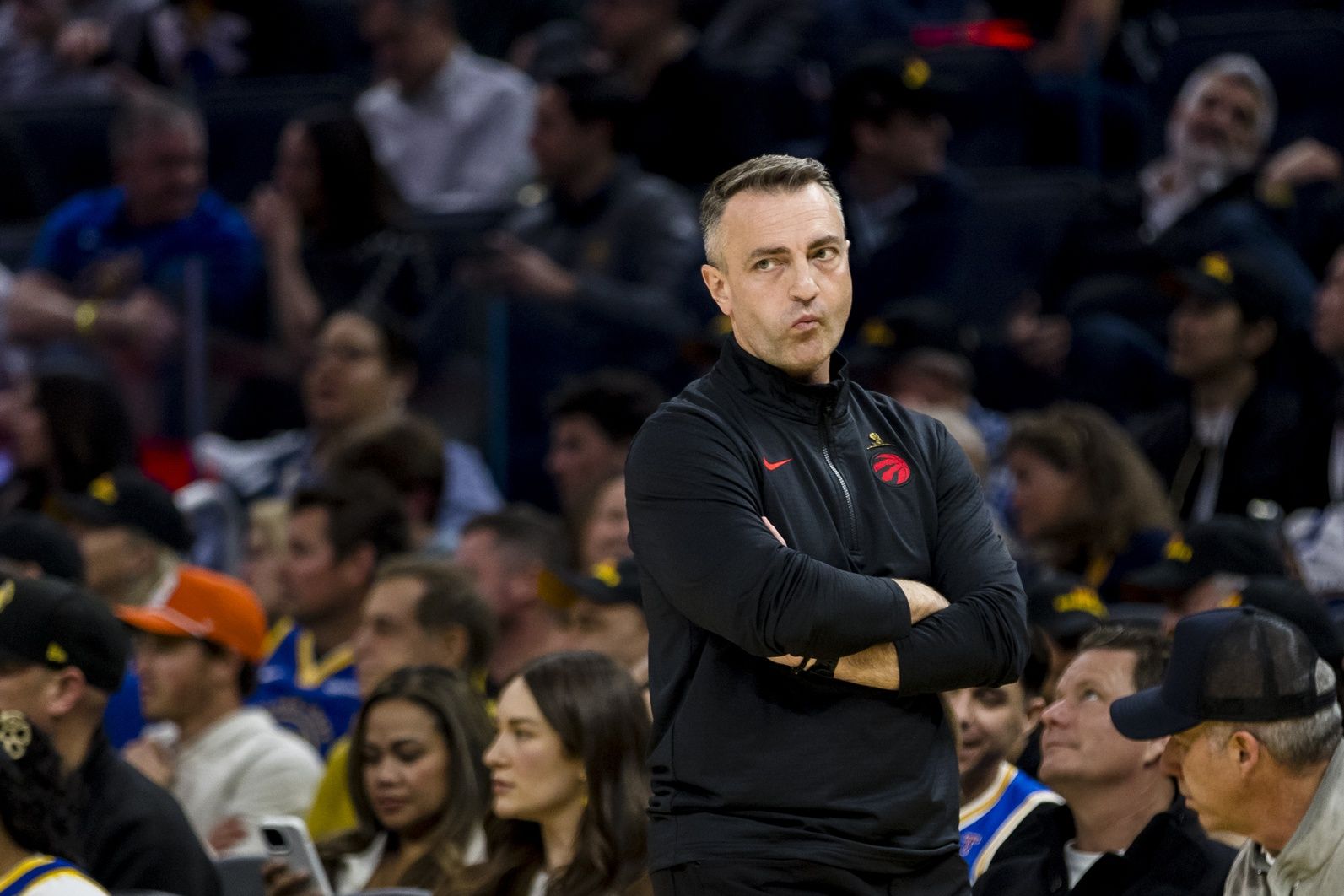 Toronto Raptors head coach Darko Rajakovic reacts during the first quarter against the Golden State Warriors at Chase Center.