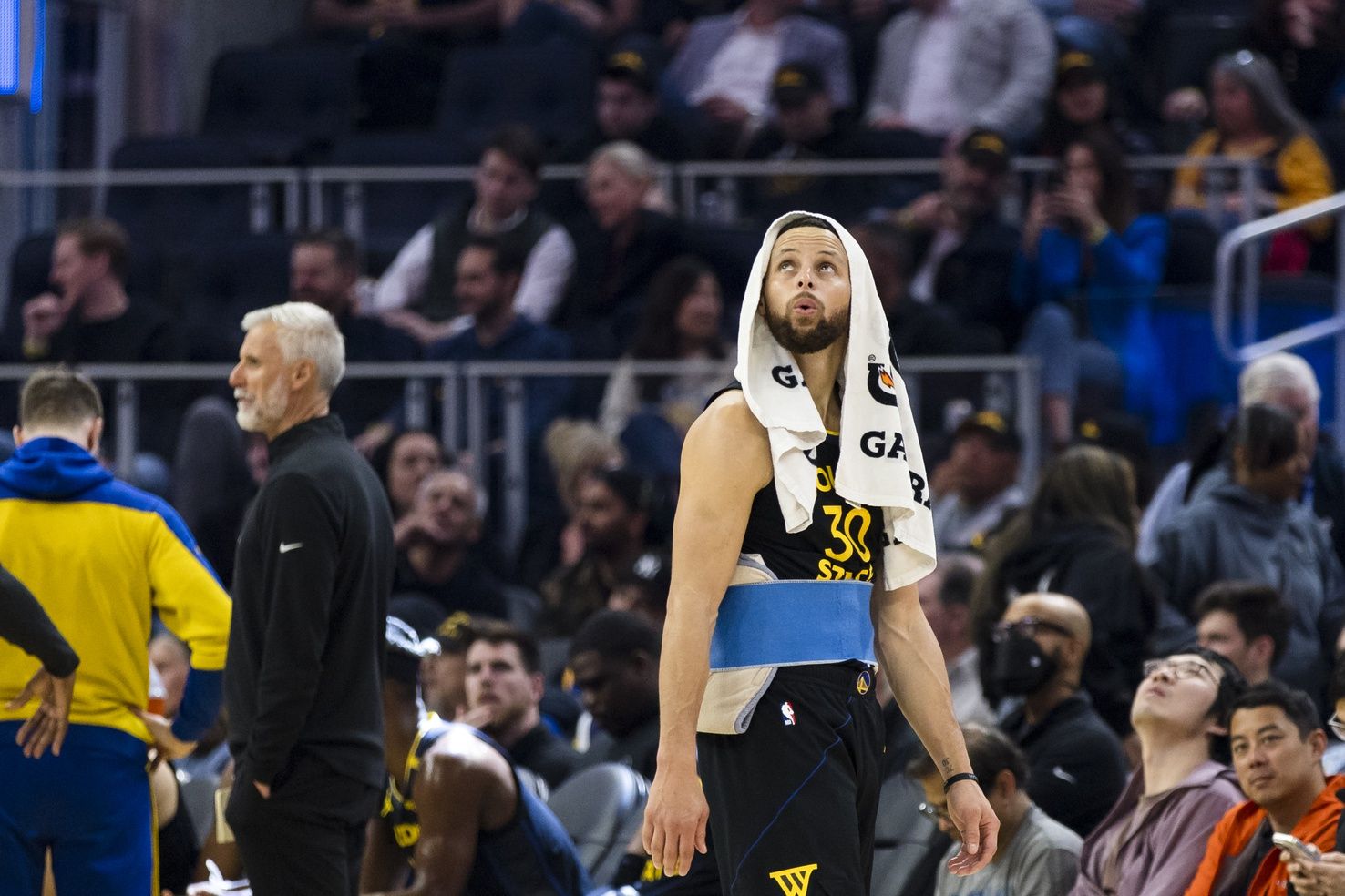 Golden State Warriors guard Stephen Curry (30) watches a replay during a review of call during the first quarter against the Toronto Raptors at Chase Center.