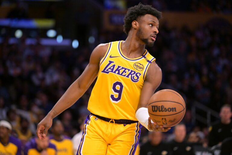 Los Angeles Lakers guard Bronny James (9) inbound the ball in the second half against the Denver Nuggets at Crypto.com Arena.