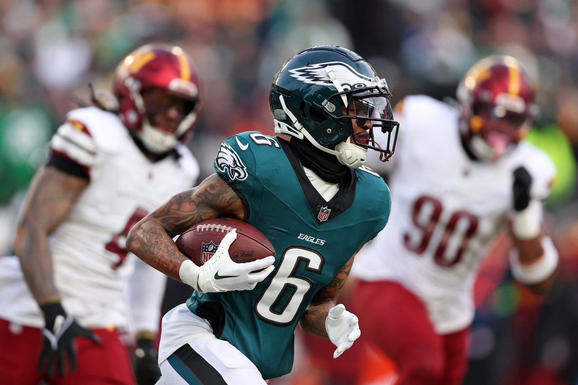 Philadelphia Eagles wide receiver DeVonta Smith (6) runs with the ball against the Washington Commanders during the first half in the NFC Championship game at Lincoln Financial Field.