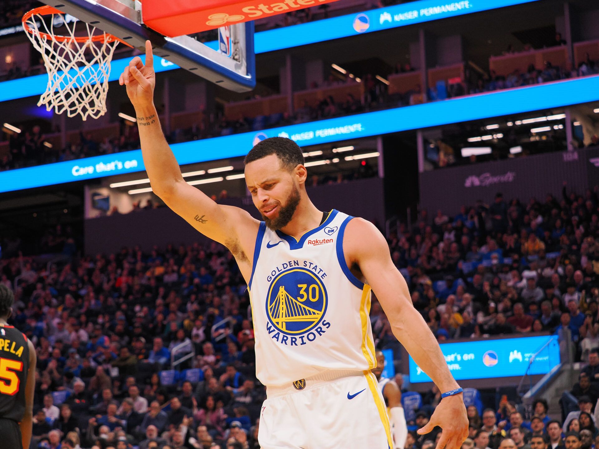 NBA fans reacted wildly after video footage of Golden State Warriors star Stephen Curry making an unreal full-court shot went viral.