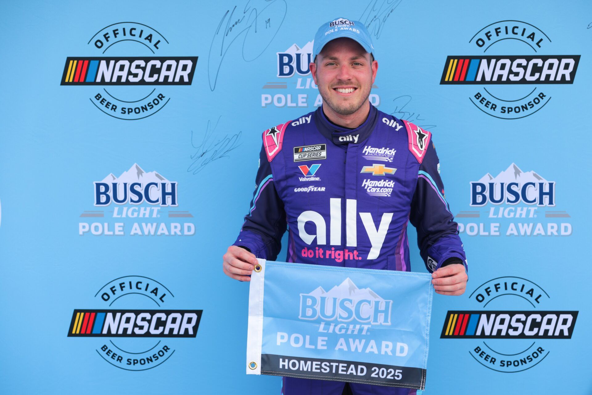 NASCAR Cup Series driver Alex Bowman (48) celebrates with Busch Light Pole Award after winning the pole for the the Straight Talk Wireless 400 at Homestead-Miami Speedway