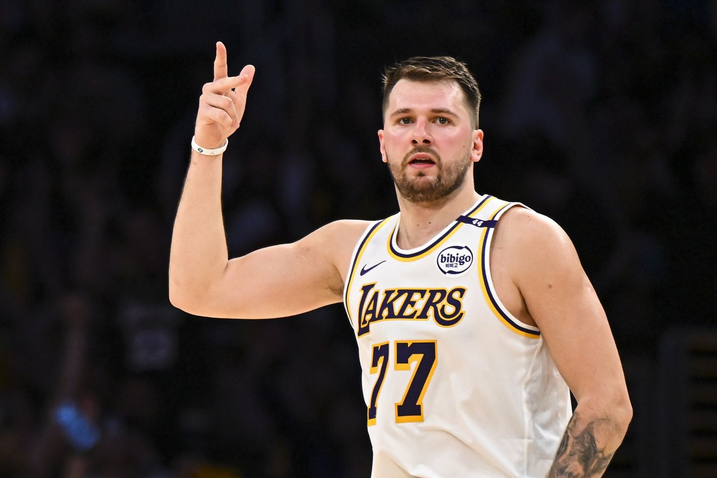 Los Angeles Lakers guard Luka Doncic (77) reacts after scoring against Chicago Bulls during the first half at Crypto.com Arena.