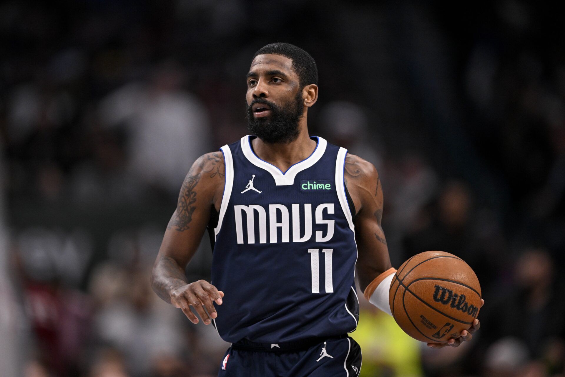 Dallas Mavericks guard Kyrie Irving (11) in action during the game between the Dallas Mavericks and the Golden State Warriors at the American Airlines Center.